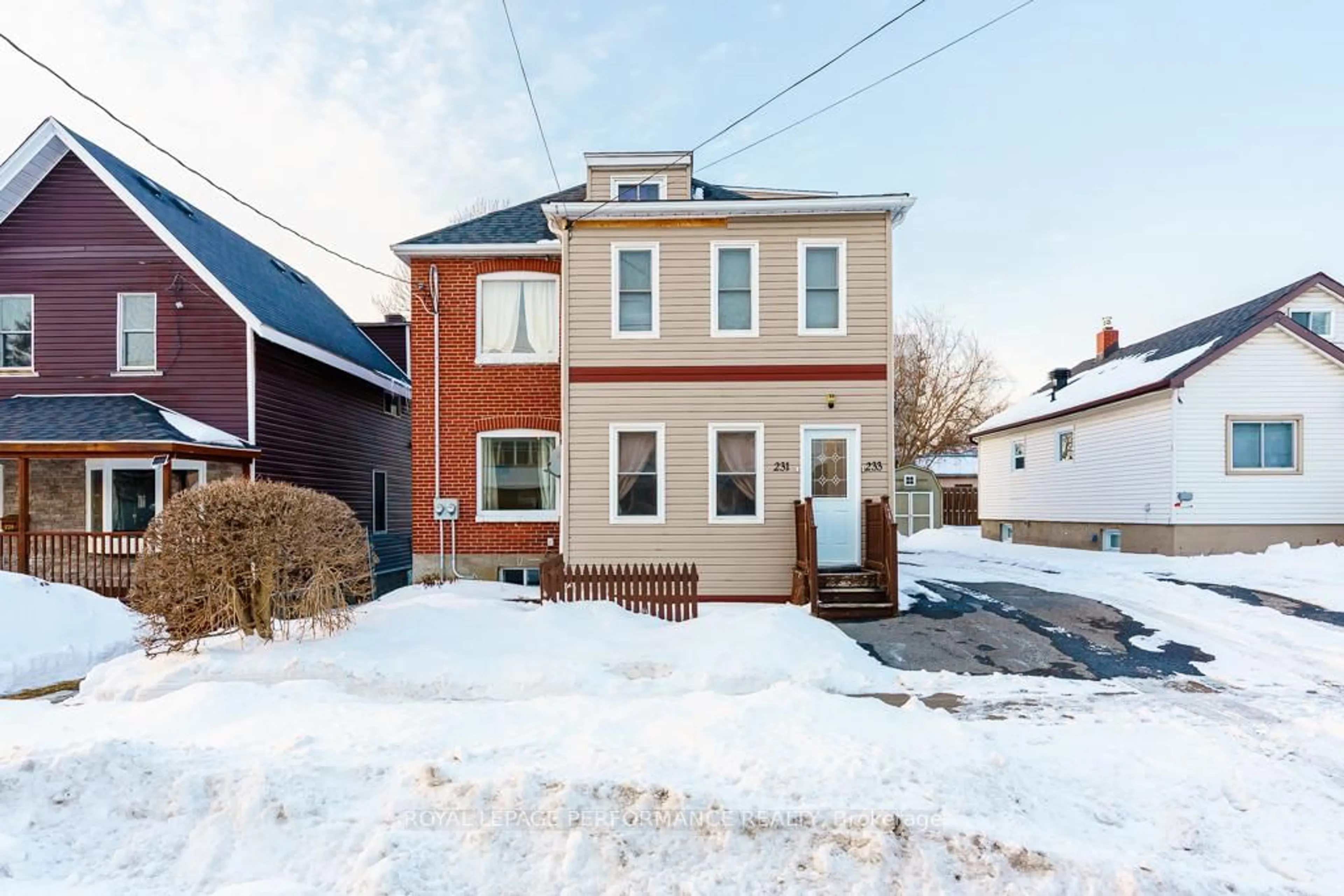 Home with brick exterior material, street for 231-233 Fifth St, Cornwall Ontario K6J 3R9