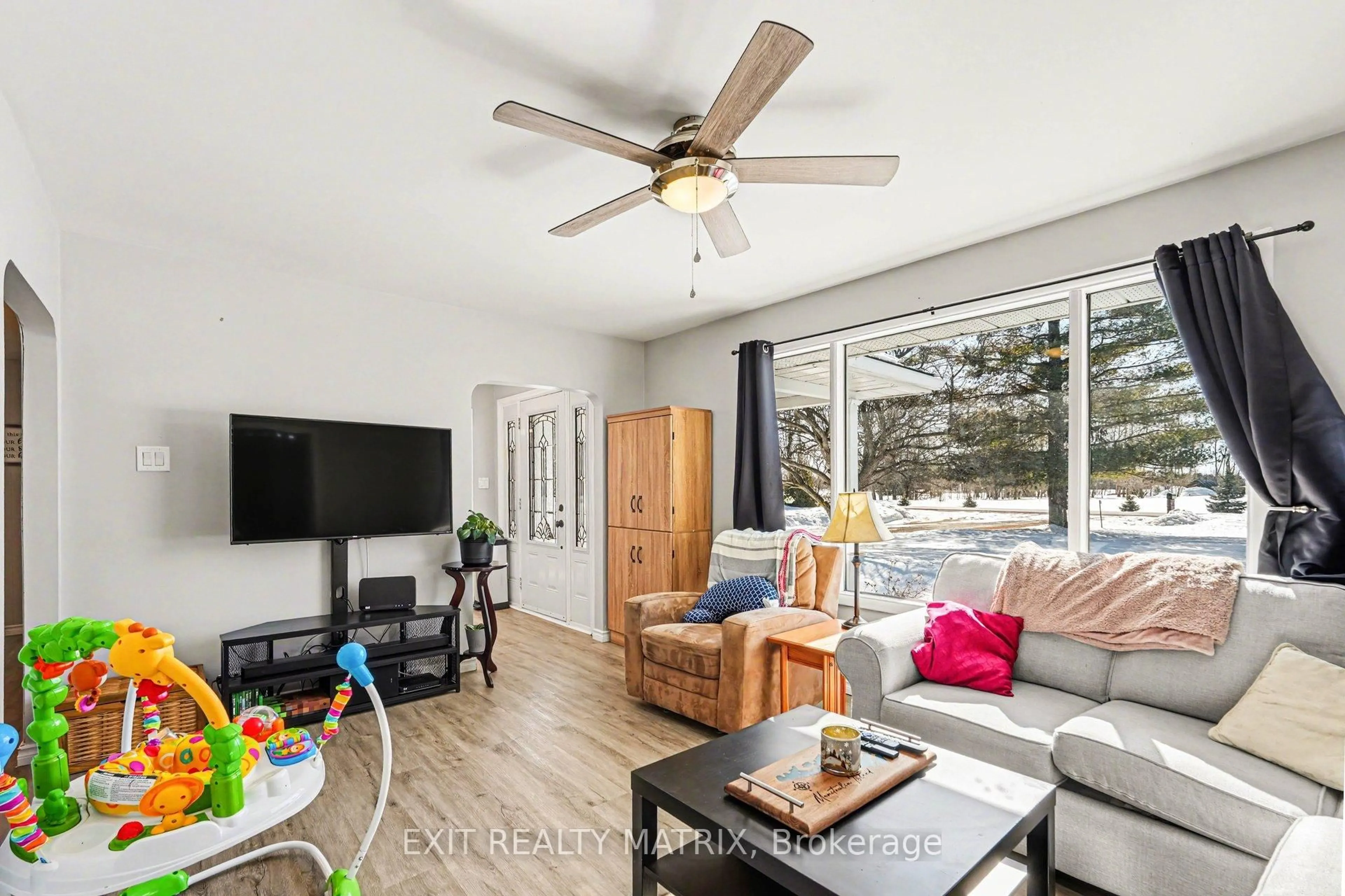 Living room with furniture, wood/laminate floor for 528 Keatley Rd, Ottawa Ontario K7S 3G7