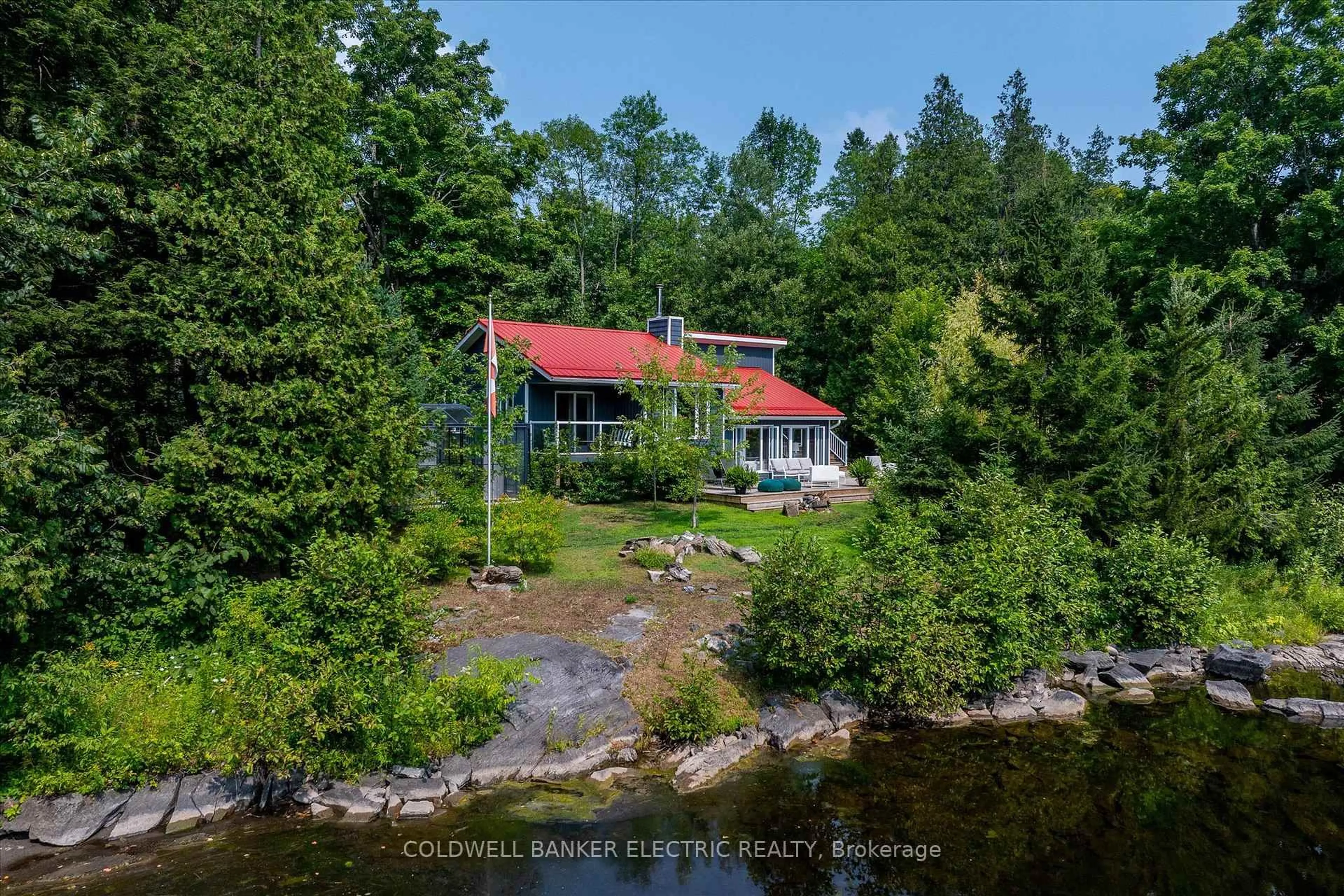 A pic from outside/outdoor area/front of a property/back of a property/a pic from drone, water/lake/river/ocean view for 411 Fidlar Glen Rd, Limoges Ontario K0K 2M0