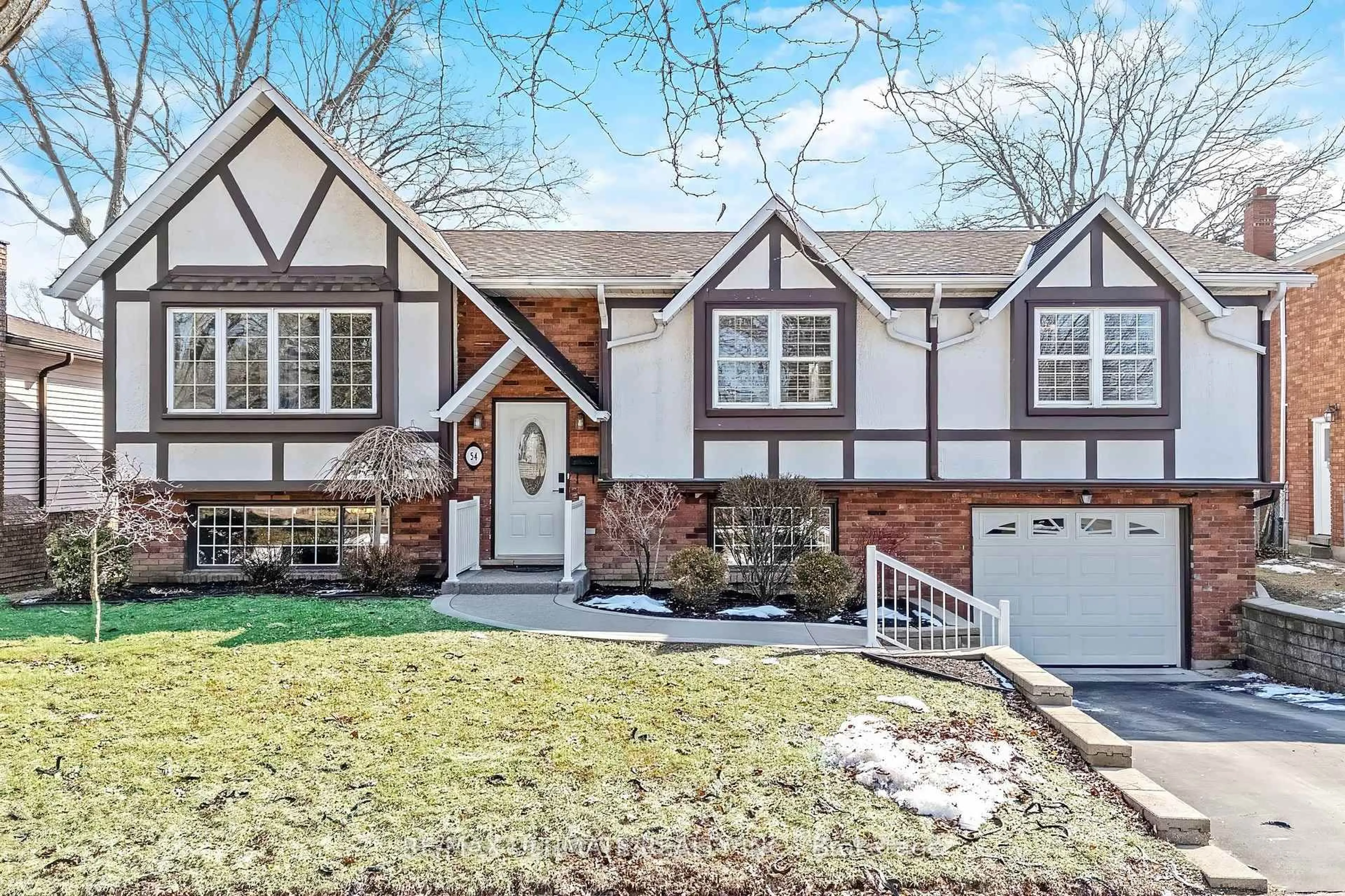 Home with vinyl exterior material, street for 54 Debora Dr, Grimsby Ontario L3M 4J3