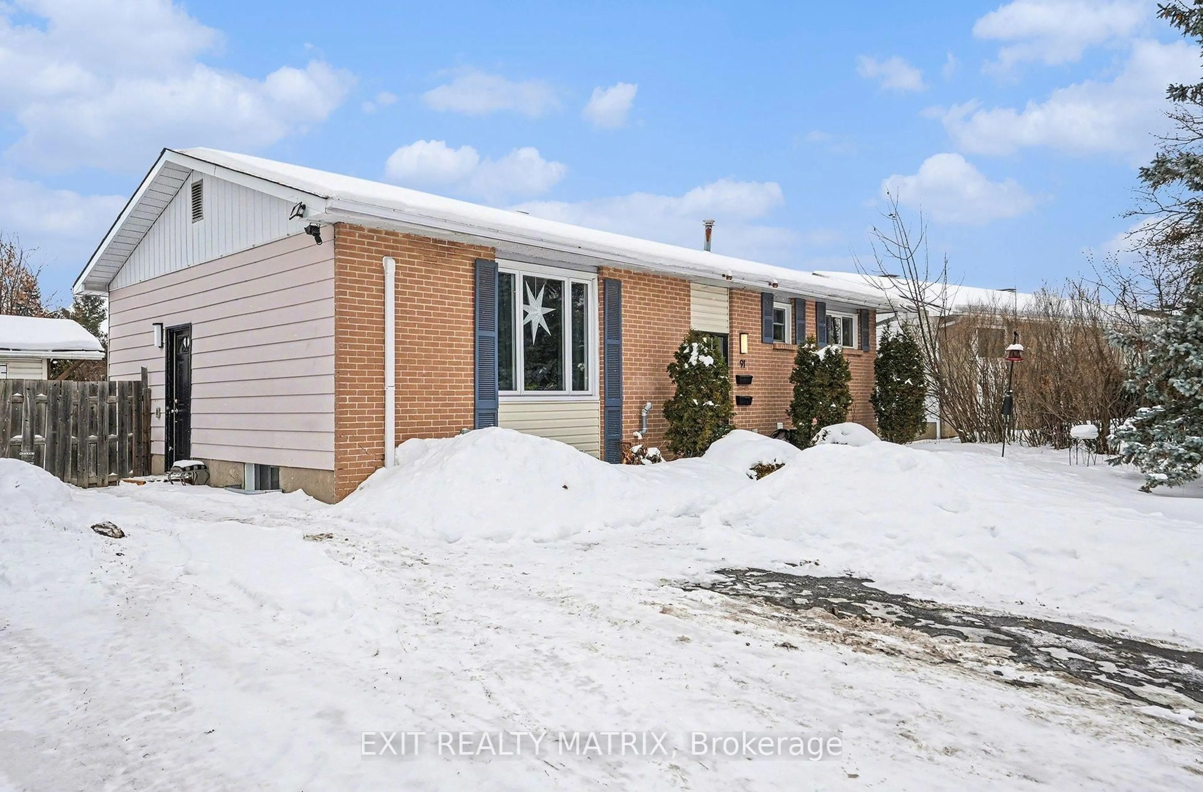 Home with brick exterior material, street for 91 Sheldrake Dr, Ottawa Ontario K2L 1T1