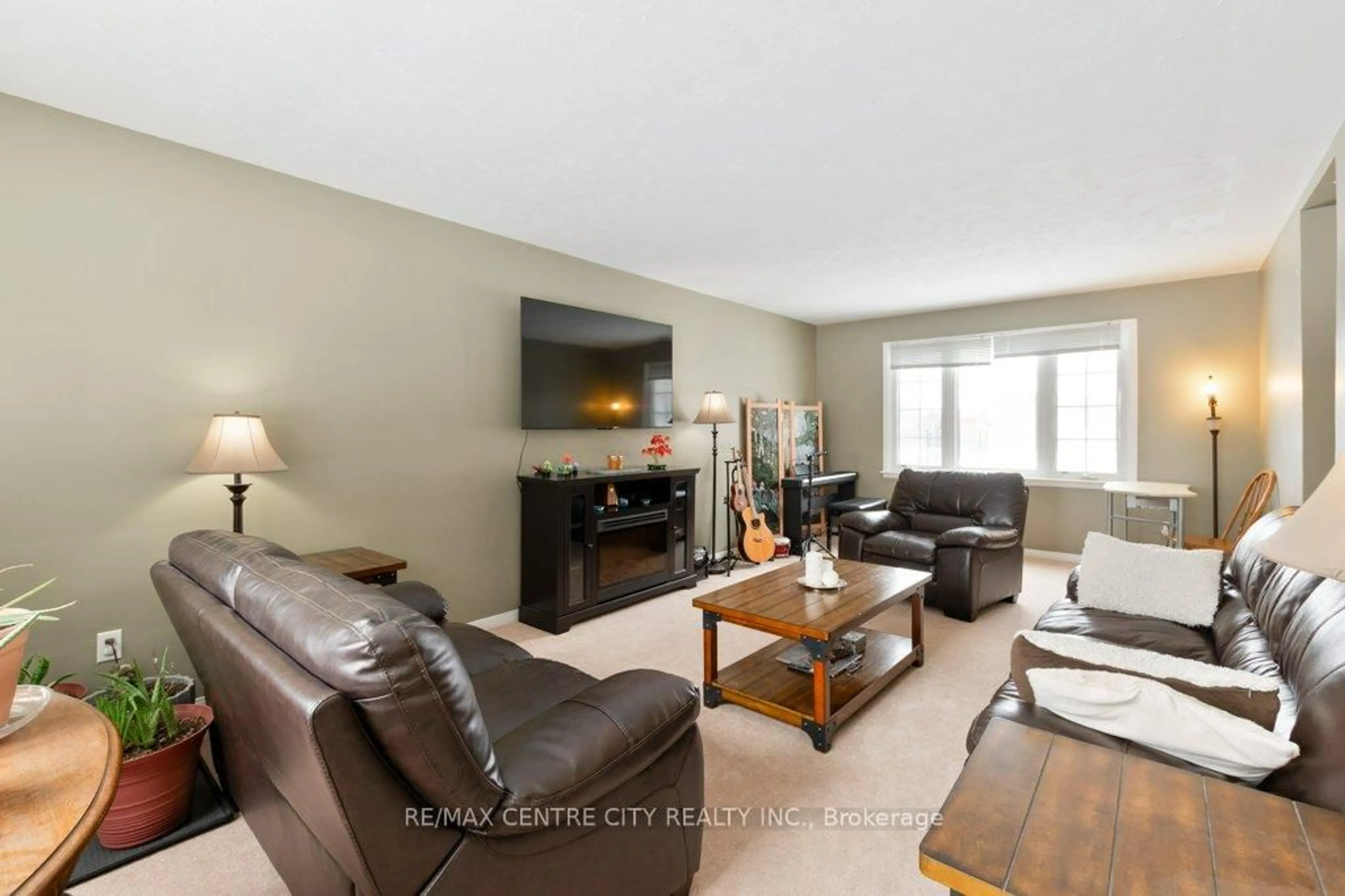 Living room with furniture, unknown for 6579 Bostwick Rd, Central Elgin Ontario N0L 2L0