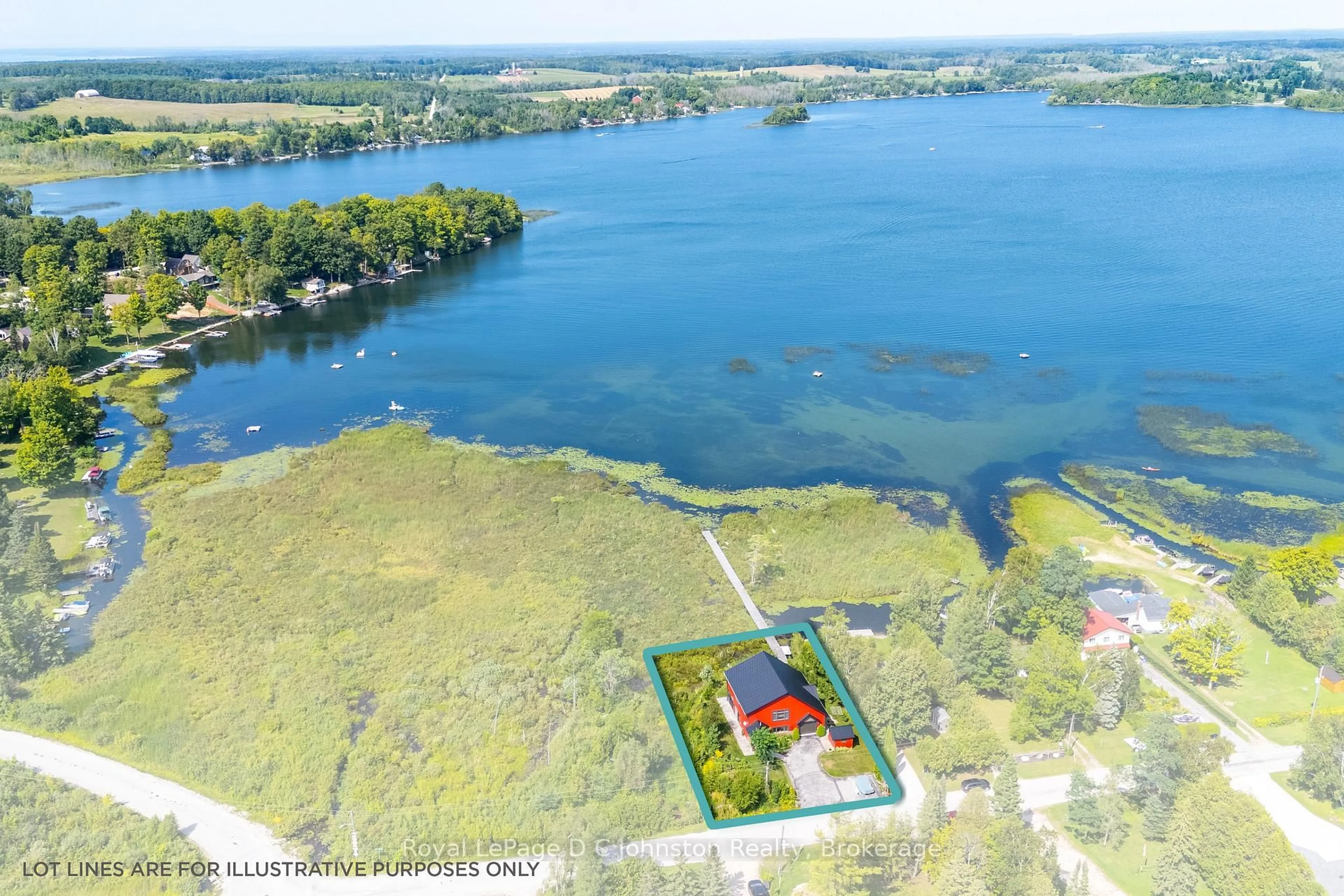 A pic from outside/outdoor area/front of a property/back of a property/a pic from drone, water/lake/river/ocean view for 11 Lake Dr, South Bruce Peninsula Ontario N0H 1A0