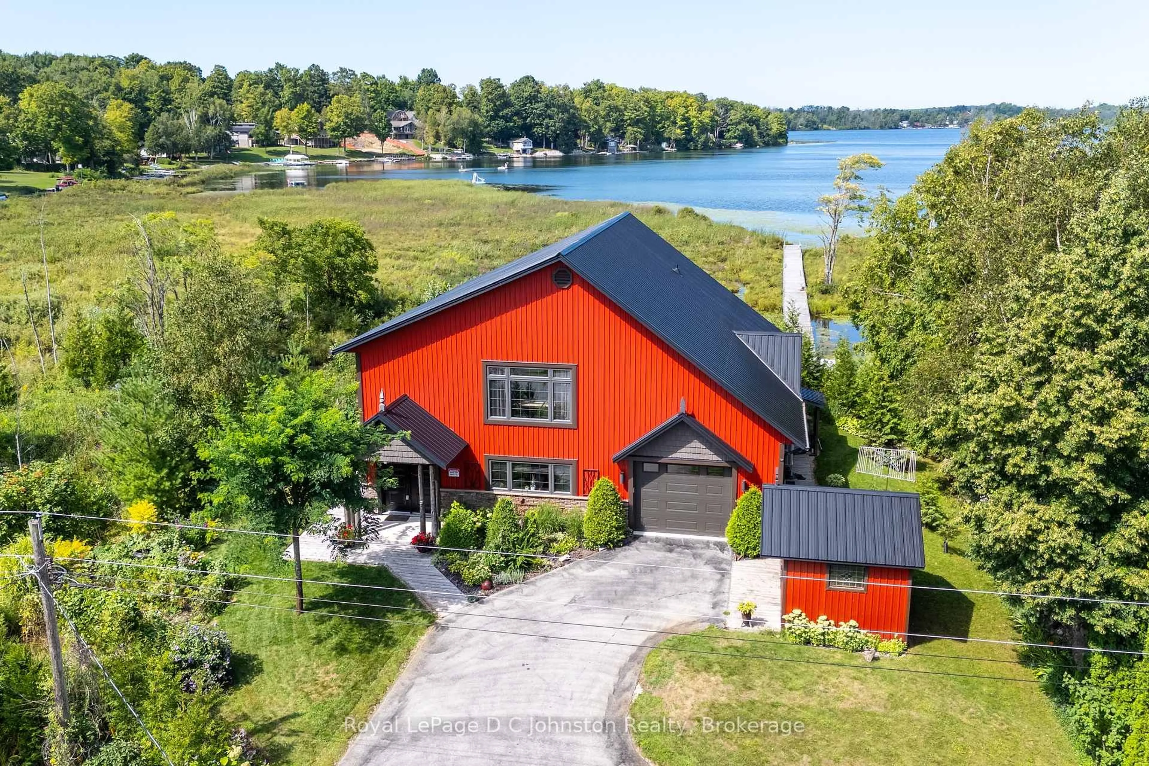 A pic from outside/outdoor area/front of a property/back of a property/a pic from drone, water/lake/river/ocean view for 11 Lake Dr, South Bruce Peninsula Ontario N0H 1A0