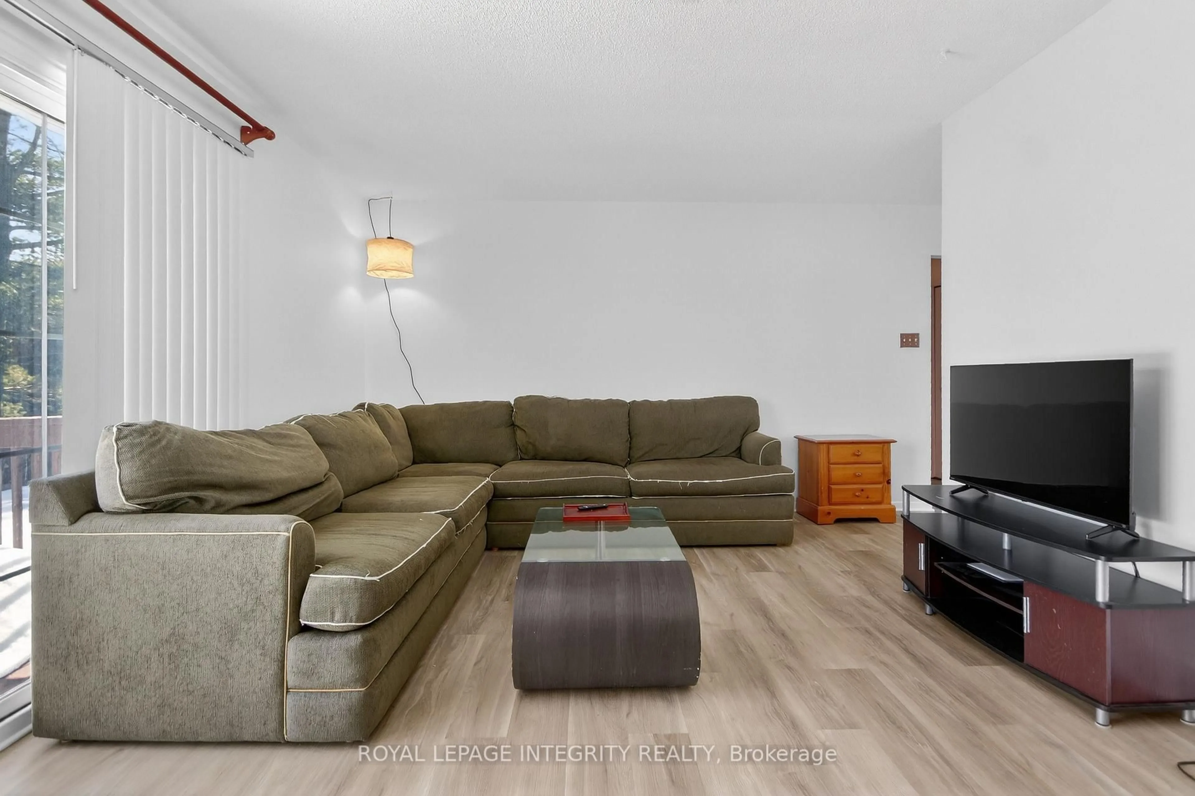 Living room with furniture, wood/laminate floor for 6054 FERNBANK Rd, Ottawa Ontario K2S 1B6