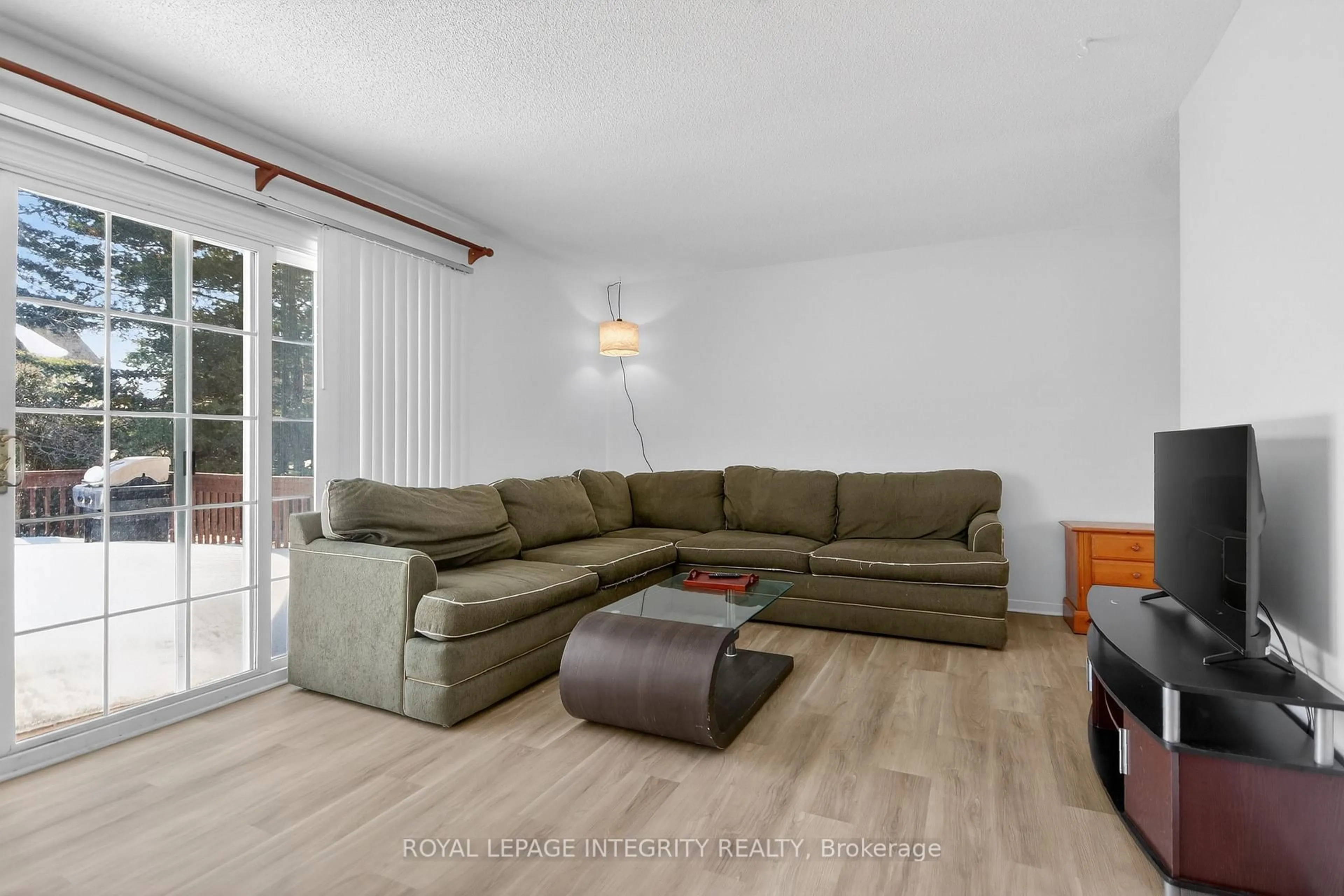 Living room with furniture, wood/laminate floor for 6054 FERNBANK Rd, Ottawa Ontario K2S 1B6