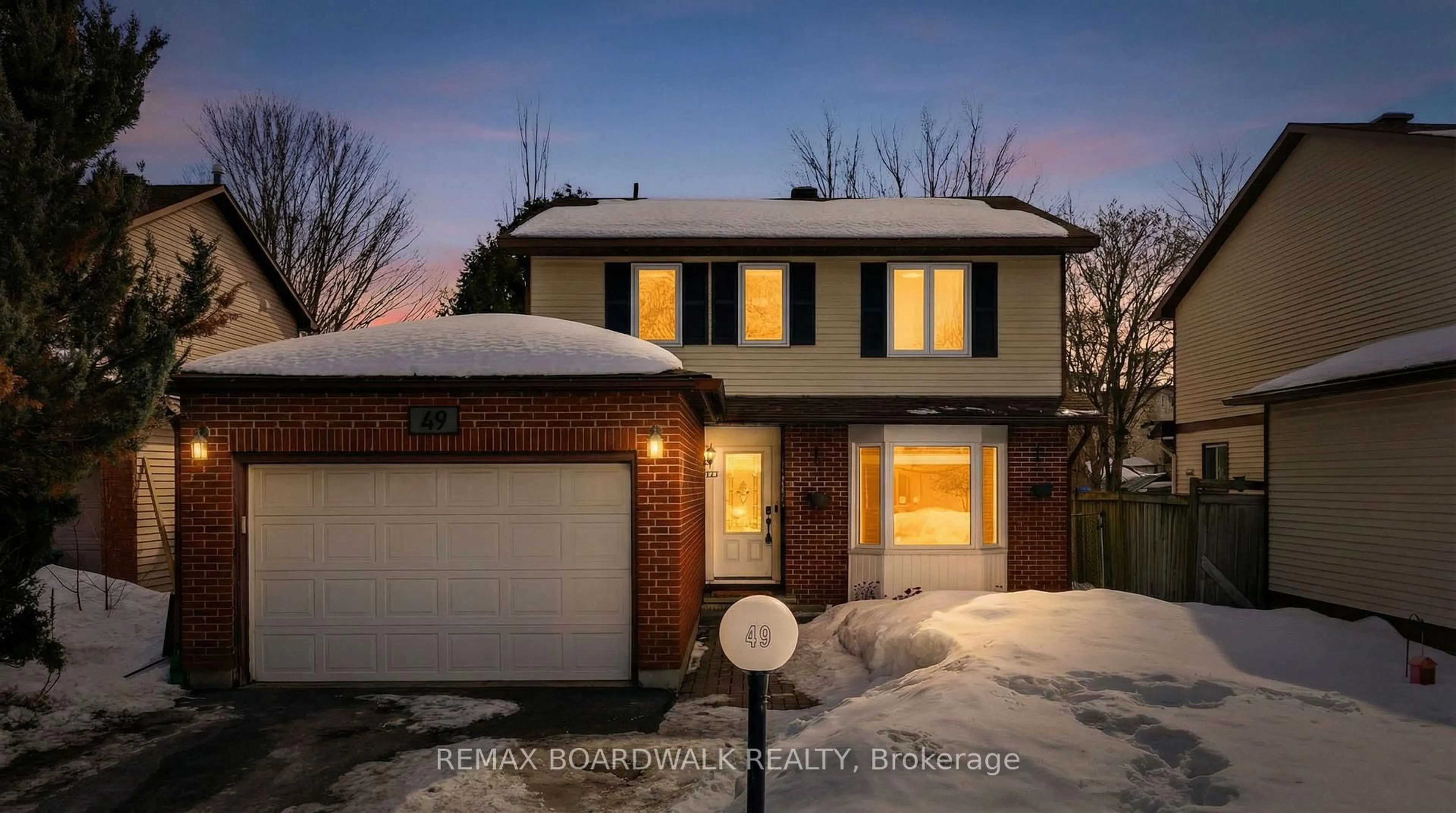 Home with brick exterior material, street for 49 Liston Cres, Ottawa Ontario K2L 2W3