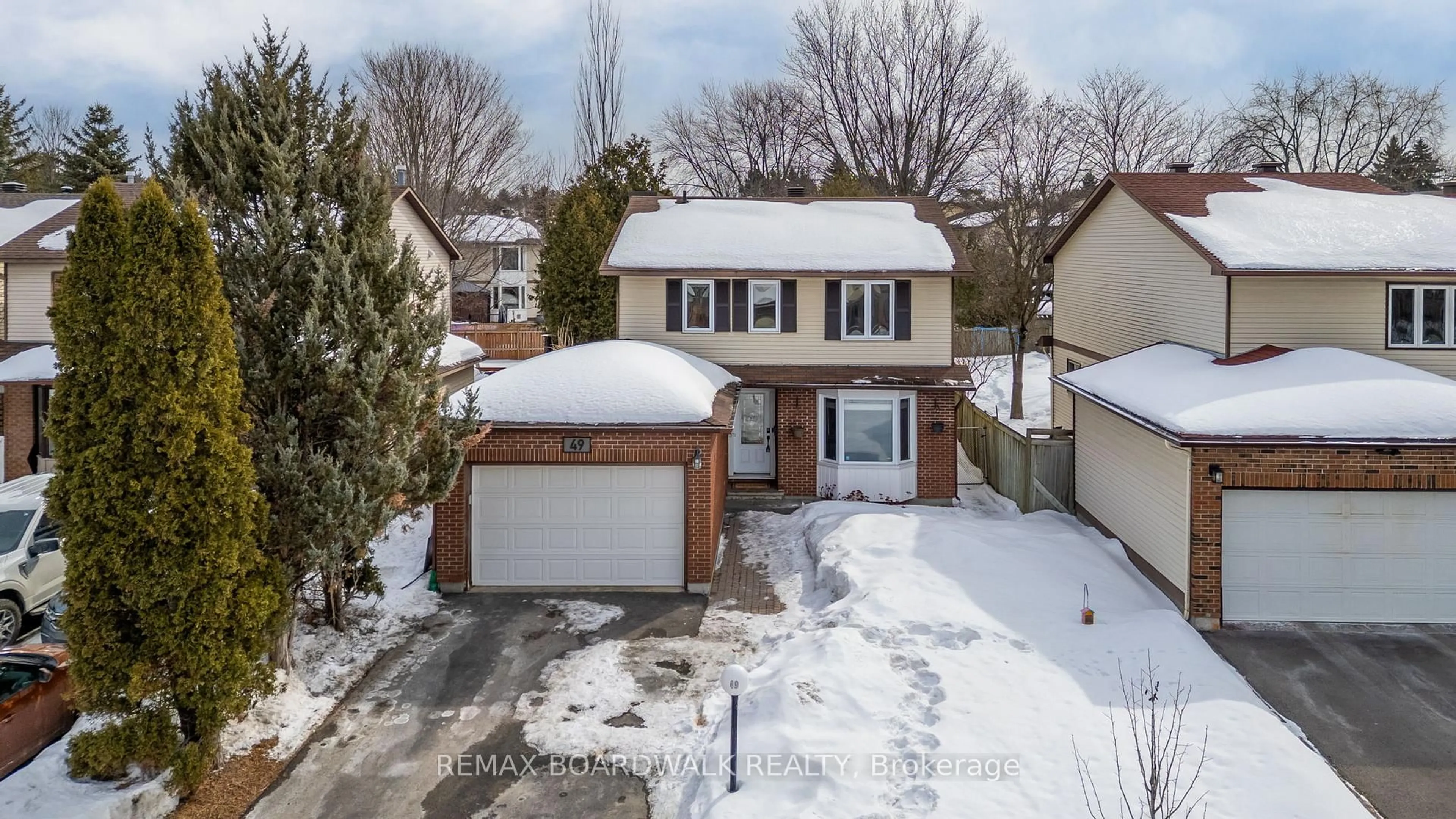 A pic from outside/outdoor area/front of a property/back of a property/a pic from drone, street for 49 Liston Cres, Ottawa Ontario K2L 2W3