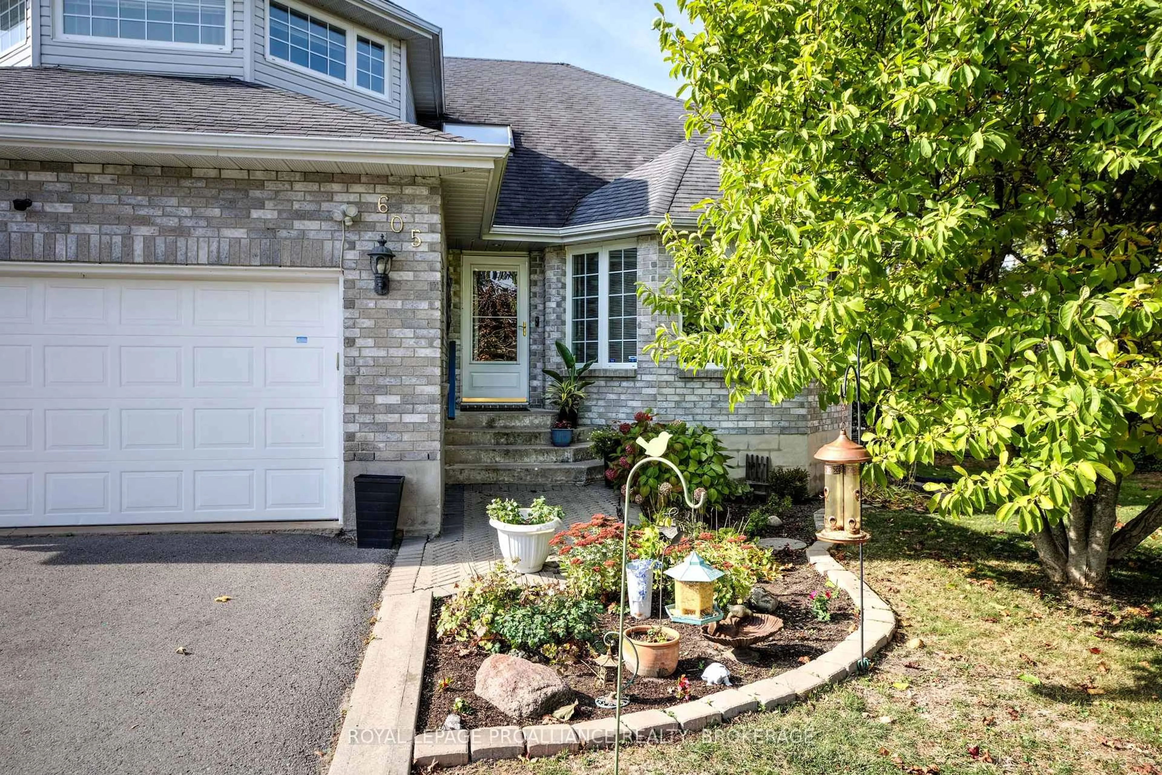 Home with brick exterior material, street for 605 Fernmoor Dr, Kingston Ontario K7M 8K5