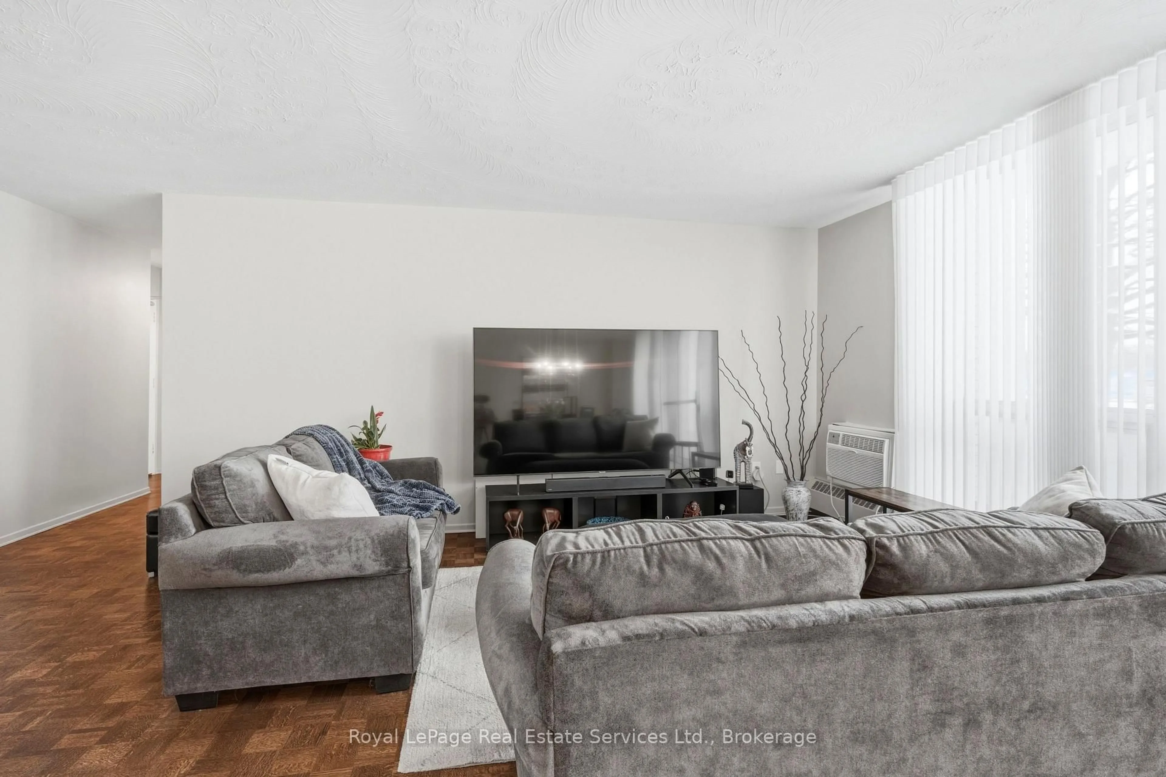 Living room with furniture, unknown for 15 Towering Heights Blvd #102, St. Catharines Ontario L2T 3G7