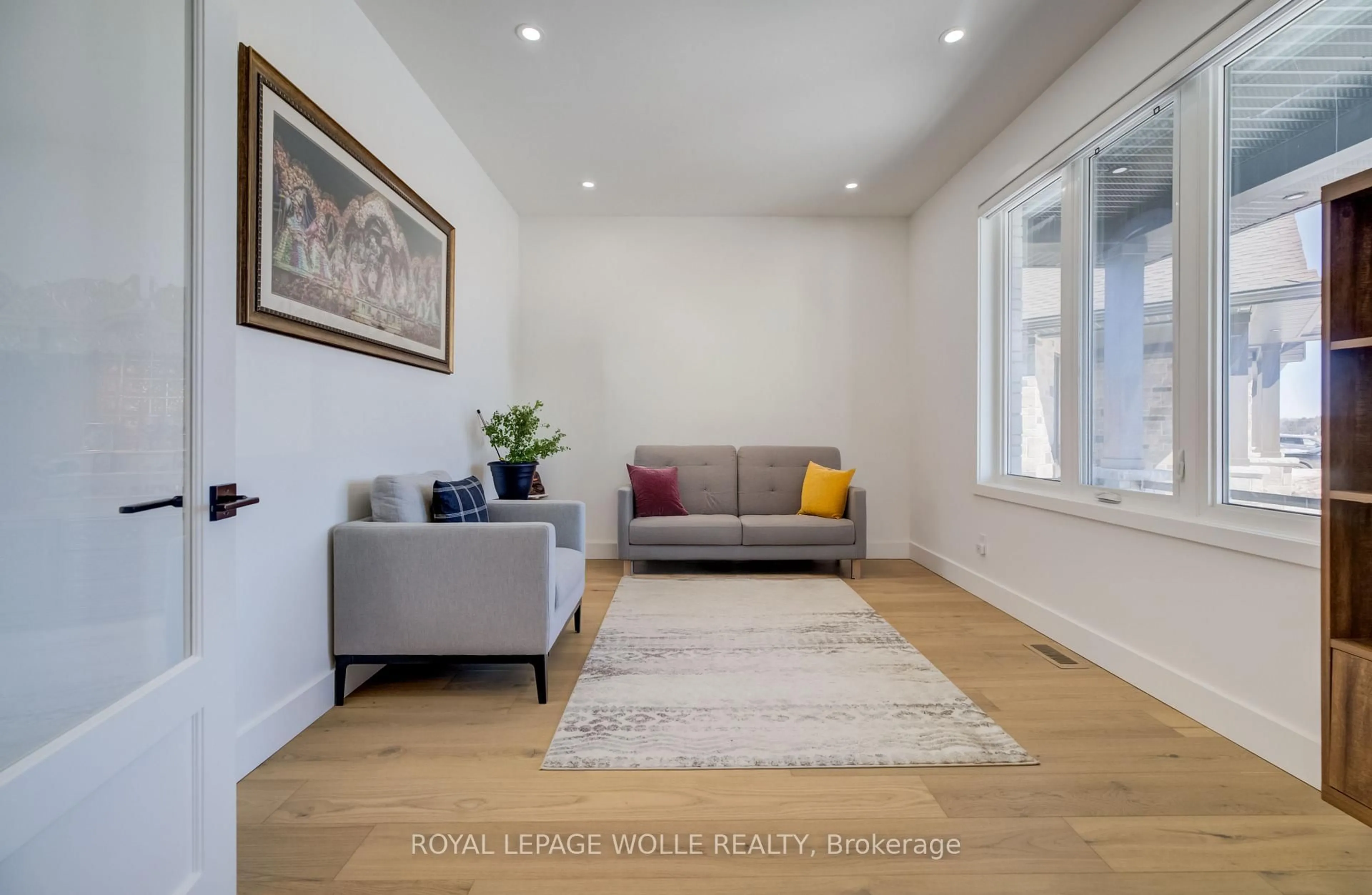 Living room with furniture, wood/laminate floor for 311 Orr St, Stratford Ontario N5A 0J7