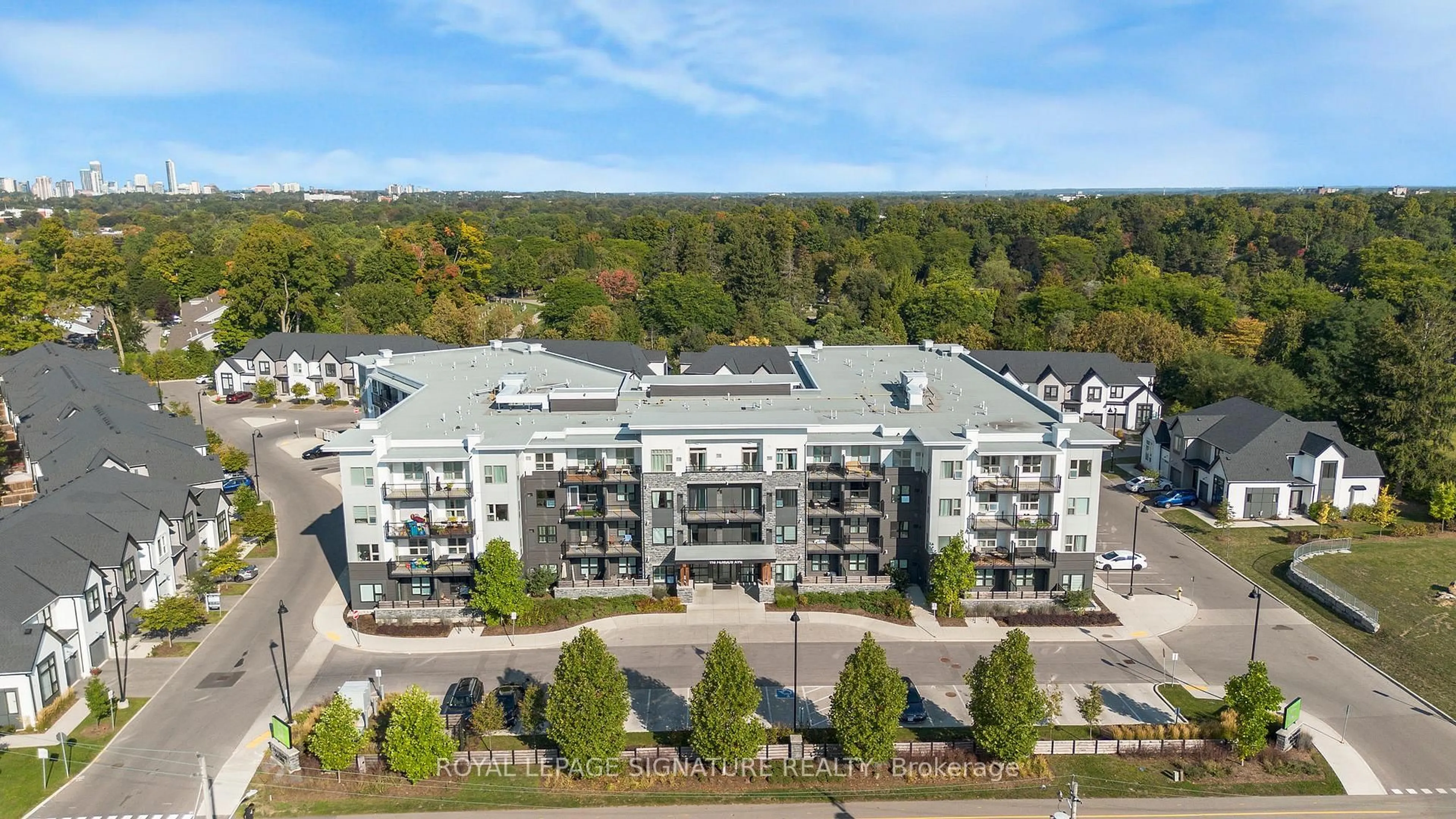 A pic from outside/outdoor area/front of a property/back of a property/a pic from drone, building for 110 Fergus Ave #211, Kitchener Ontario N2A 0K9
