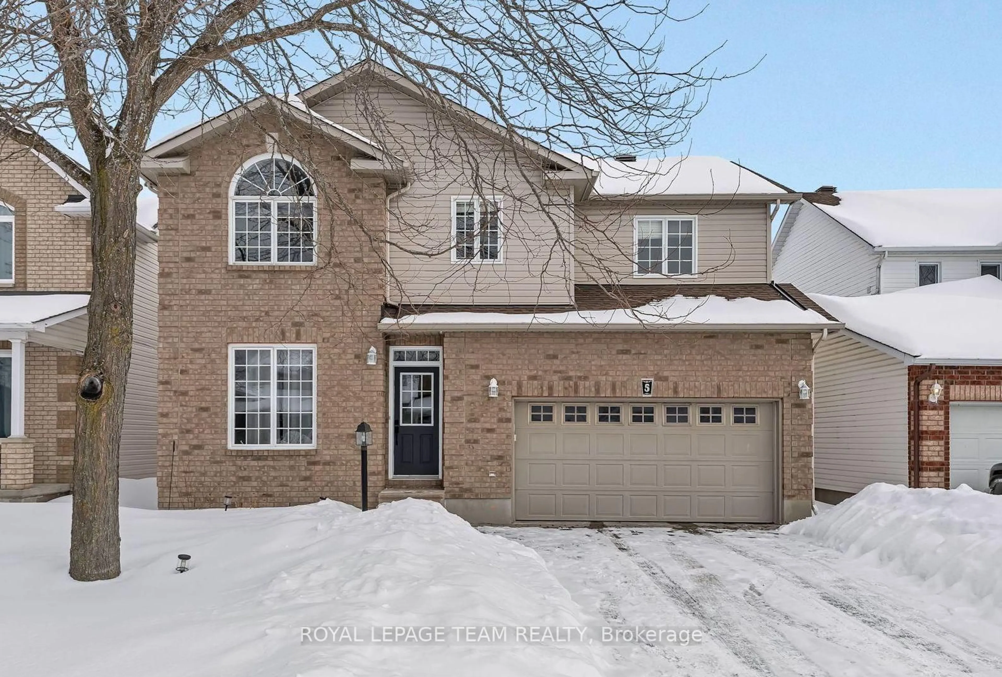 Home with brick exterior material, street for 5 Sundew Crt, Stittsville Ontario K2S 1Z5