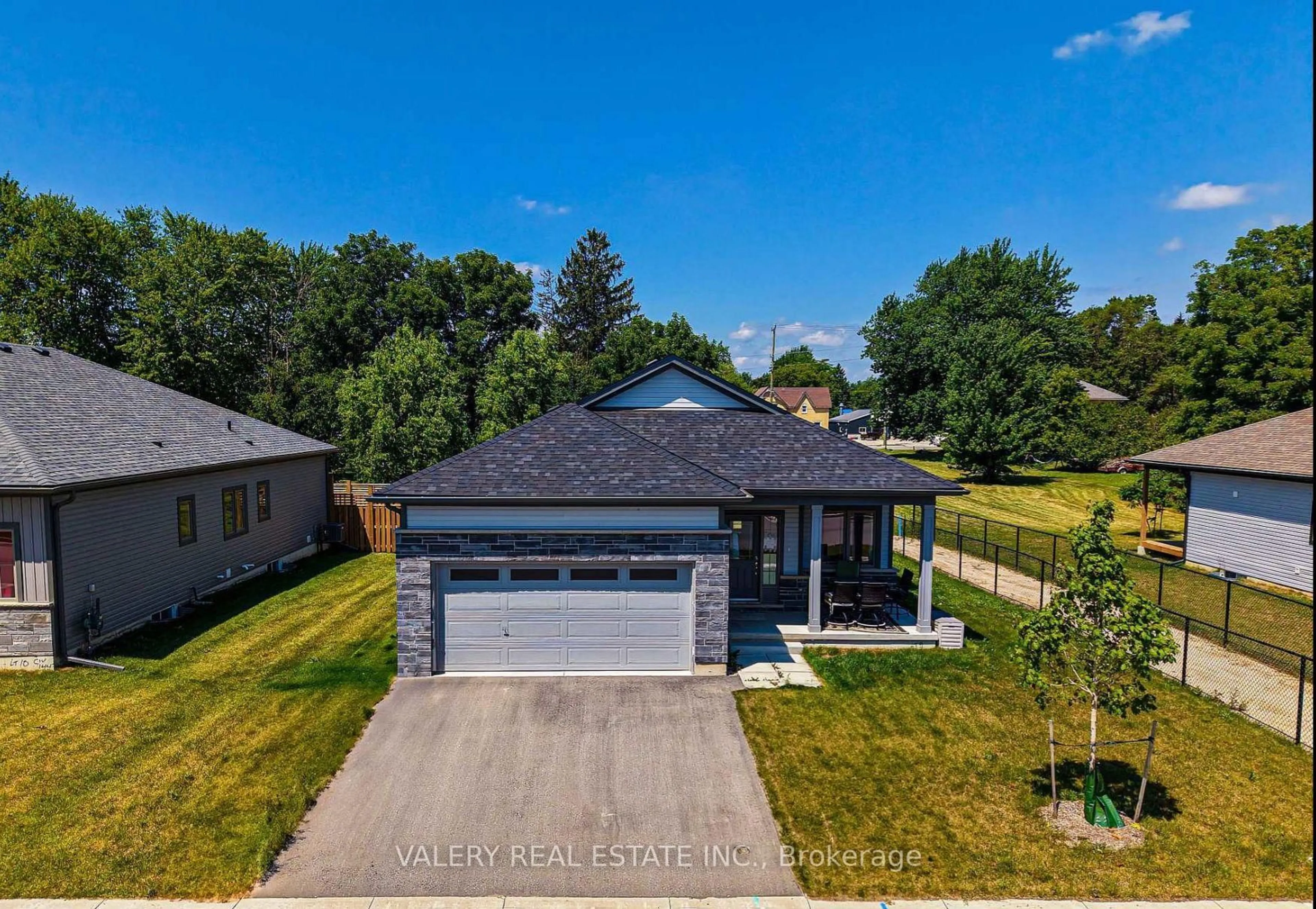 A pic from outside/outdoor area/front of a property/back of a property/a pic from drone, street for 142 Ellen St, North Perth Ontario N0G 1B0