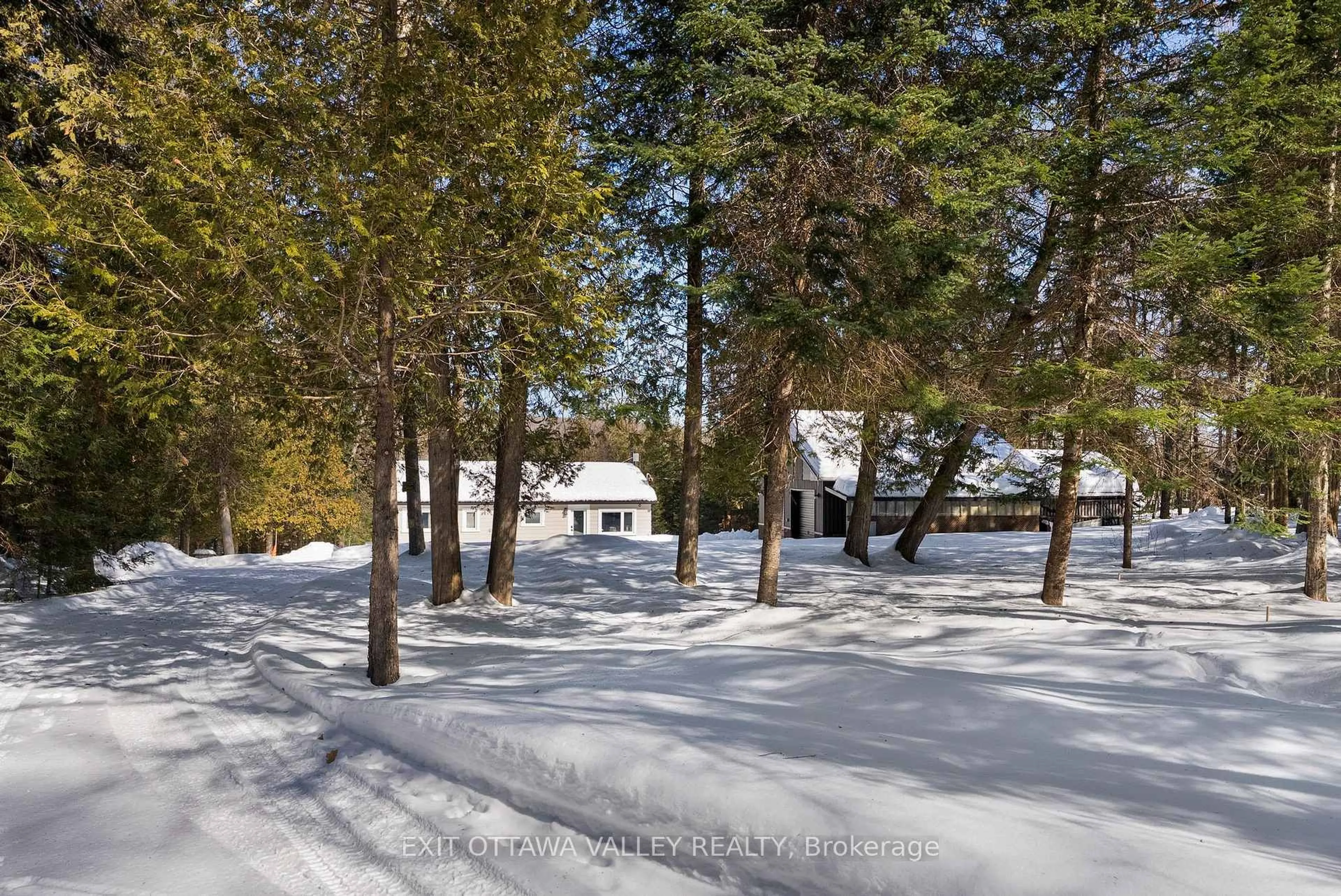 A pic from outside/outdoor area/front of a property/back of a property/a pic from drone, forest/trees view for 1478 Kamaniskeg Lk Rd, Combermere Ontario K0J 1L0