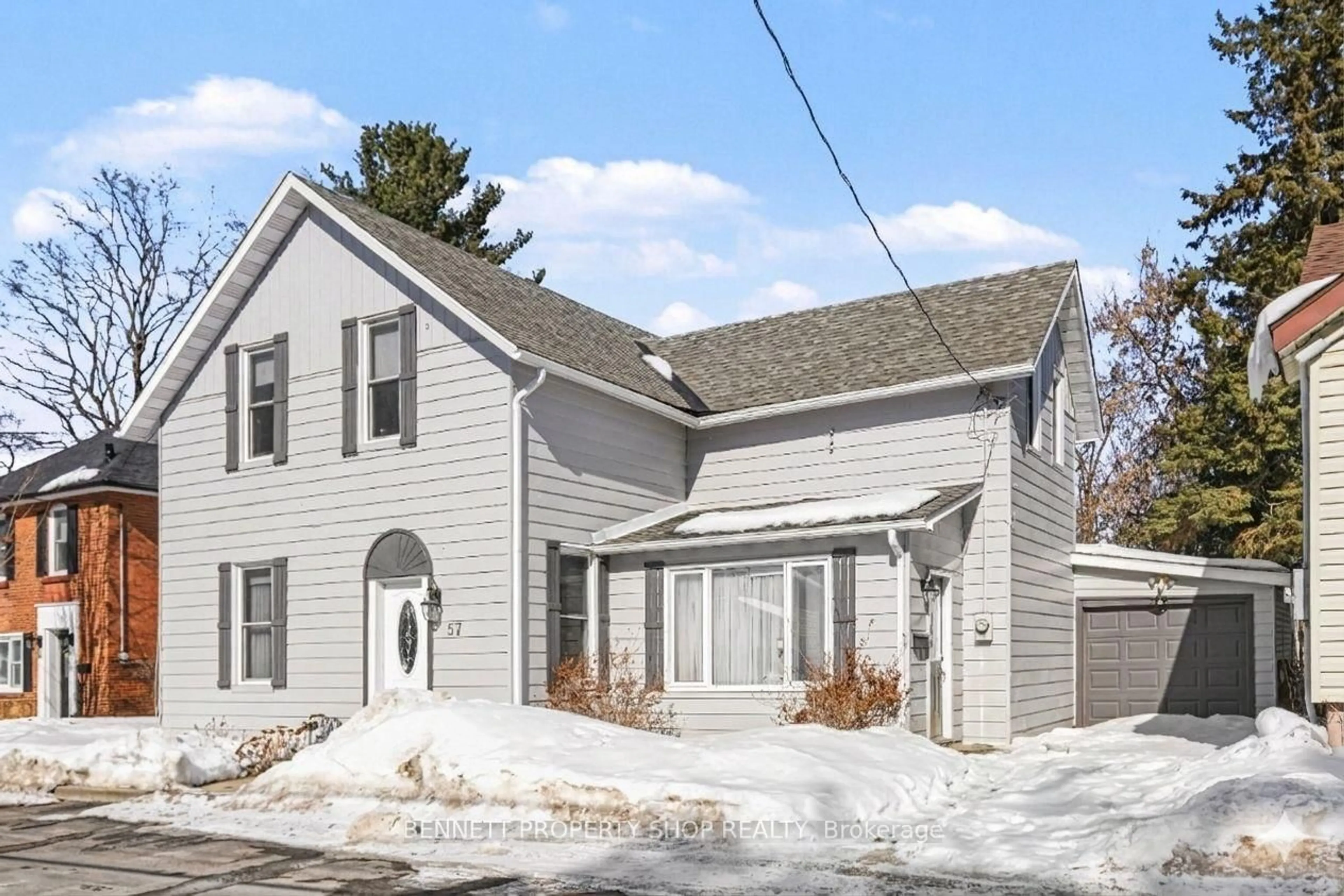 Home with vinyl exterior material, street for 57 Charles St, Carleton Place Ontario K7C 2Y2