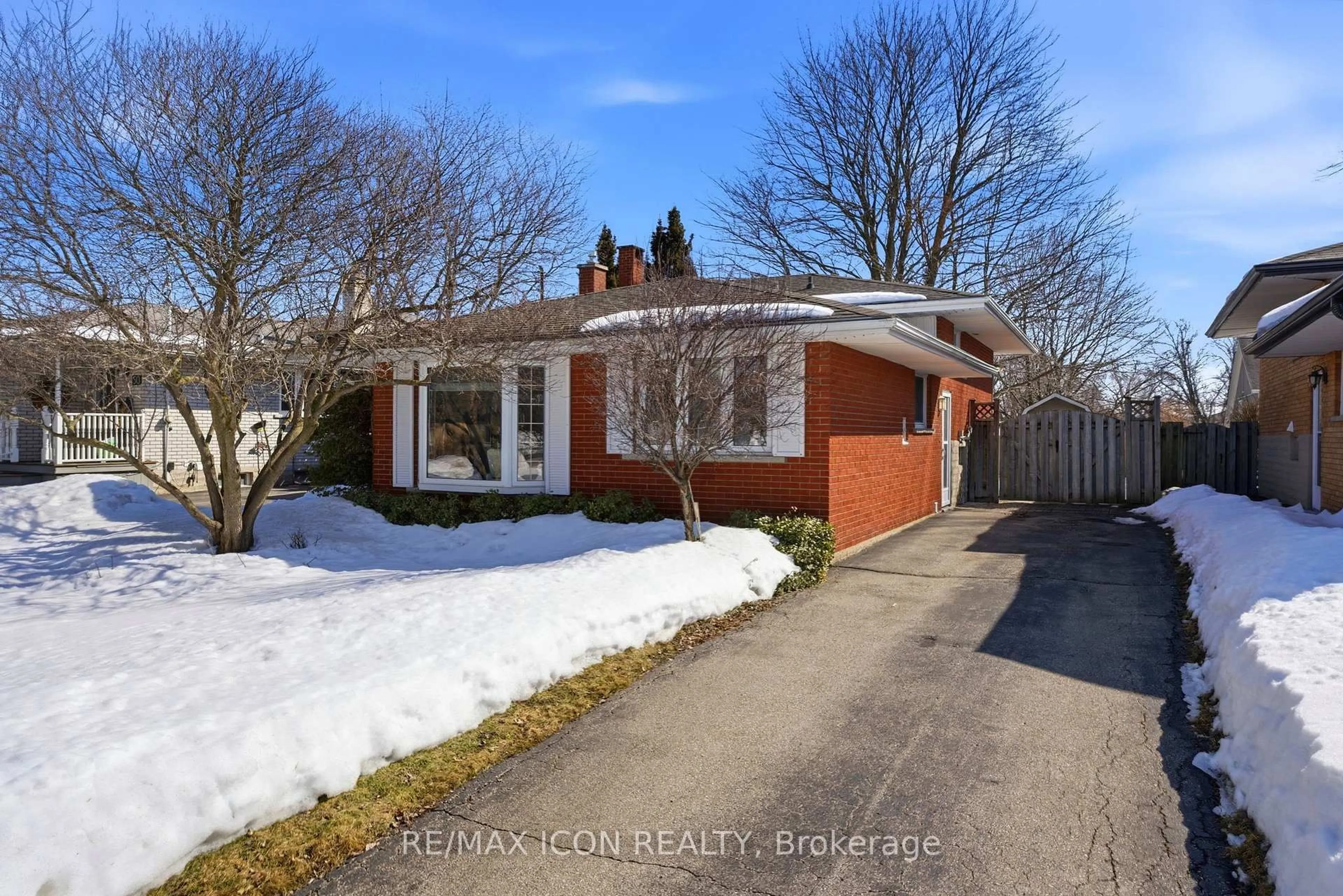 Home with brick exterior material, street for 54 Duncairn Ave, Kitchener Ontario N2M 4S4