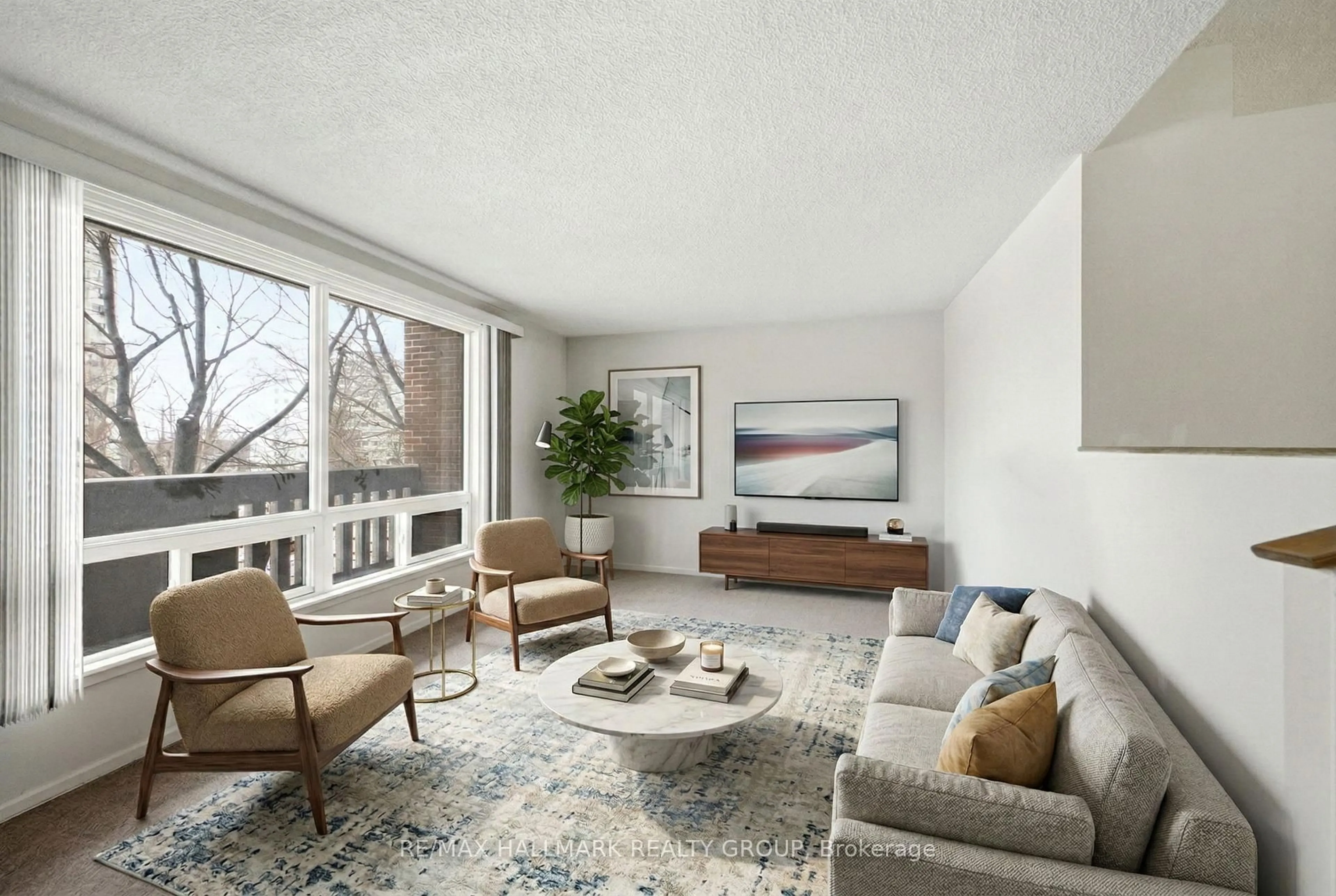 Living room with furniture, unknown for 1100 Ambleside Dr #315, Ottawa Ontario K2B 8G6