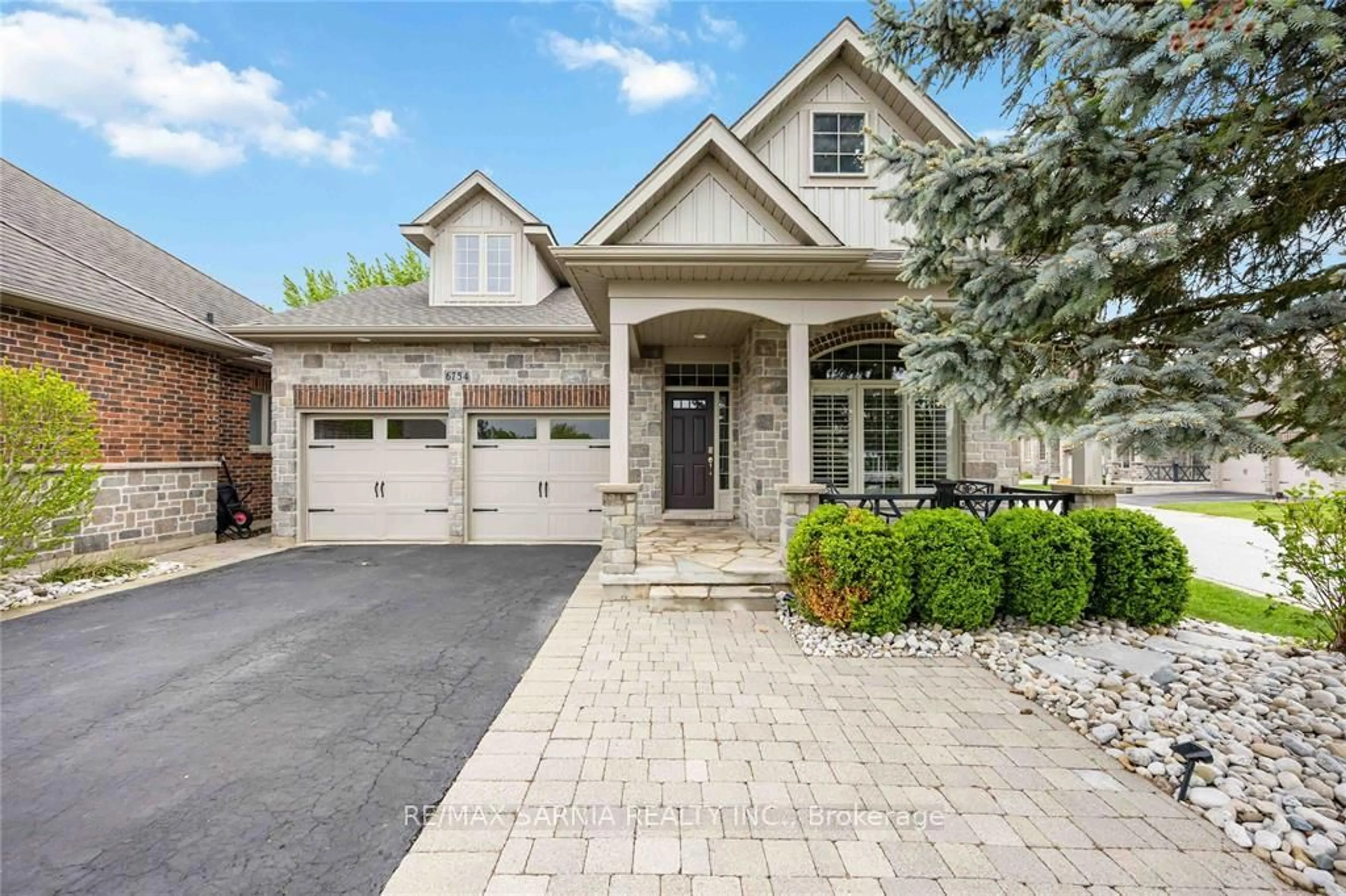 Home with brick exterior material, street for 6754 St Andrew Circ #24, Plympton-Wyoming Ontario N0N 1E0