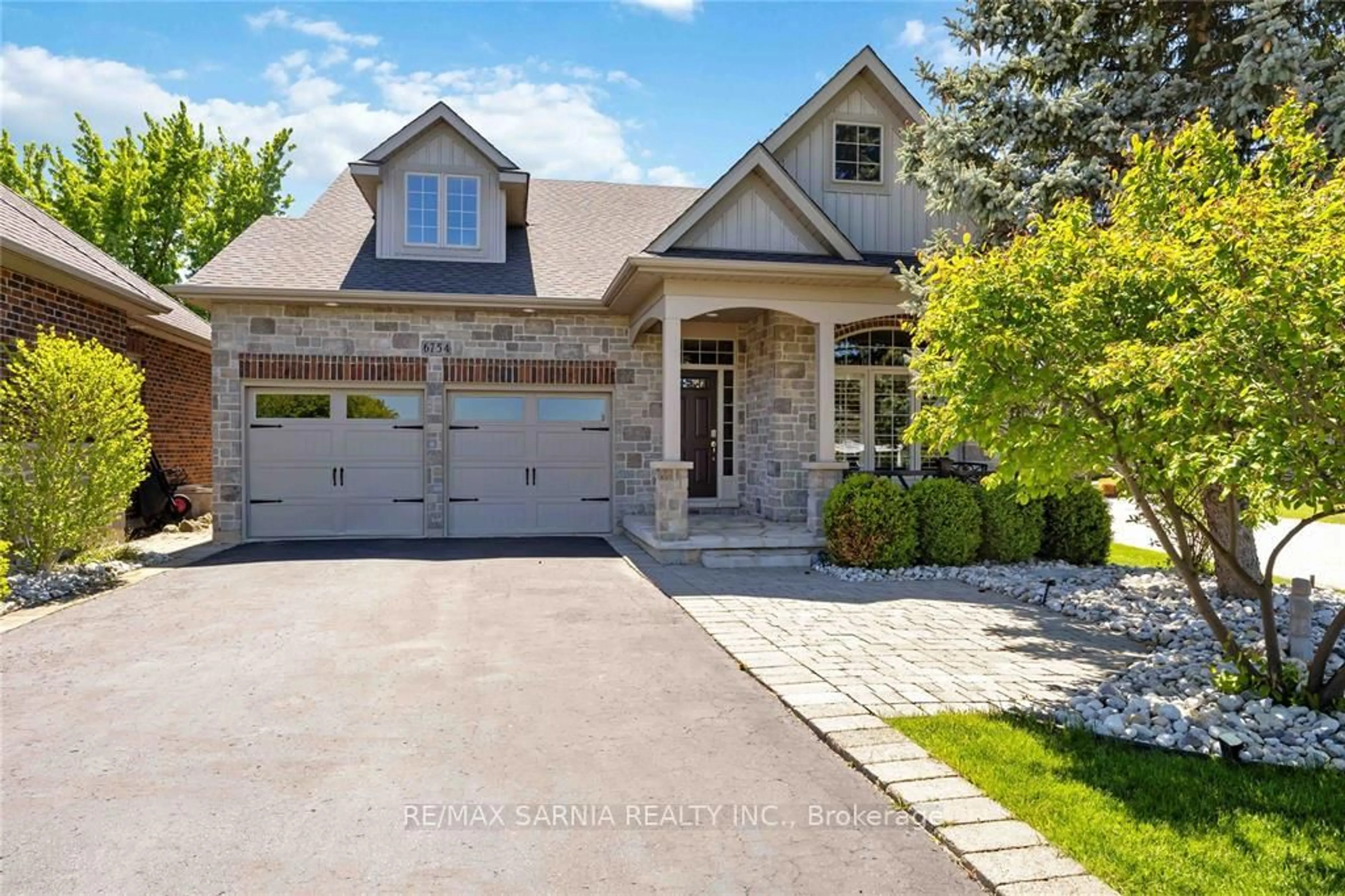 Home with brick exterior material, street for 6754 St Andrew Circ #24, Plympton-Wyoming Ontario N0N 1E0