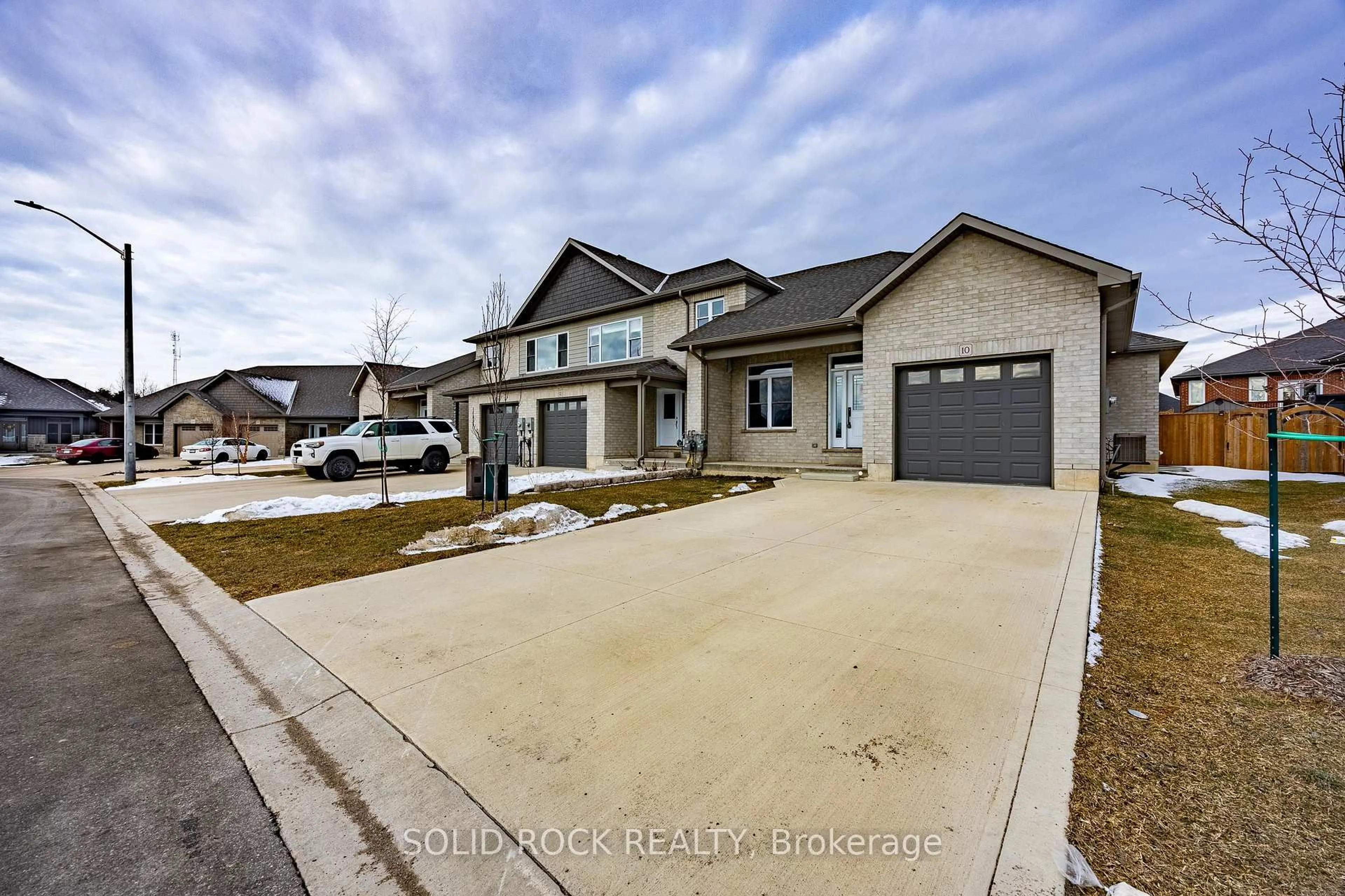 Home with brick exterior material, street for 10 Pintail Lane, Norfolk Ontario N0E 1M0