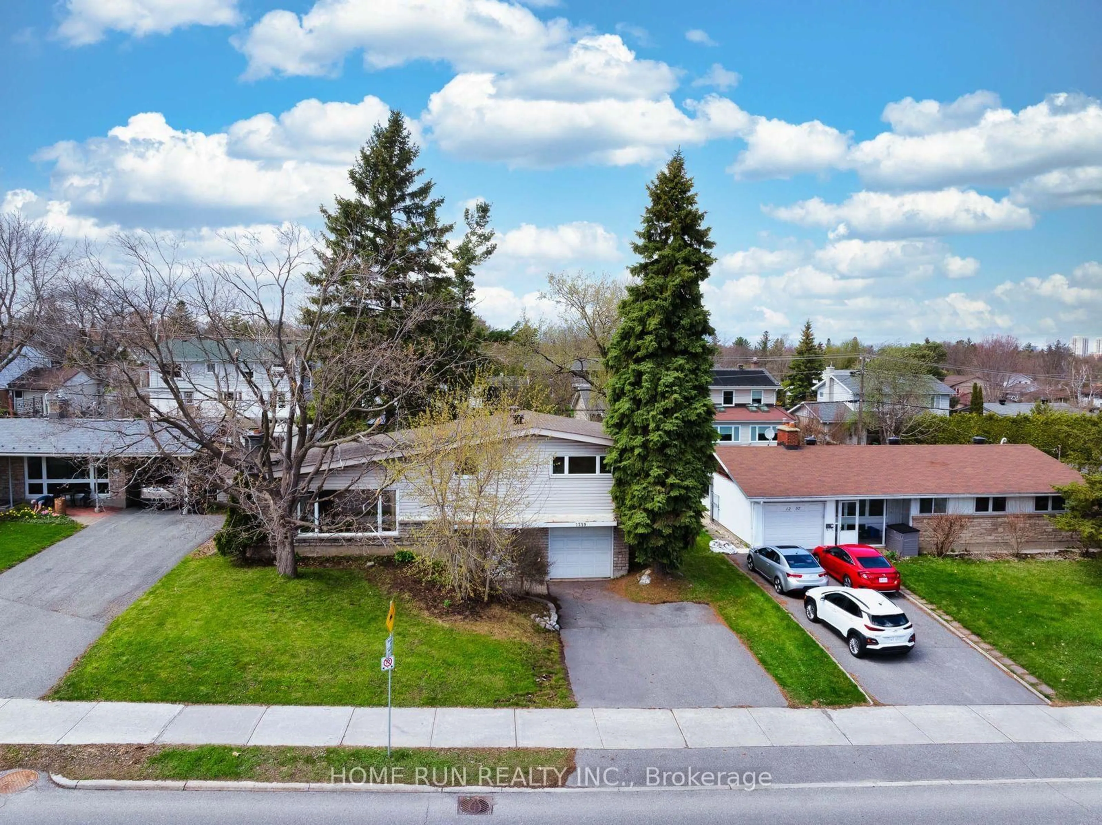 A pic from outside/outdoor area/front of a property/back of a property/a pic from drone, street for 1259 Meadowlands Dr, Ottawa Ontario K2E 6K4