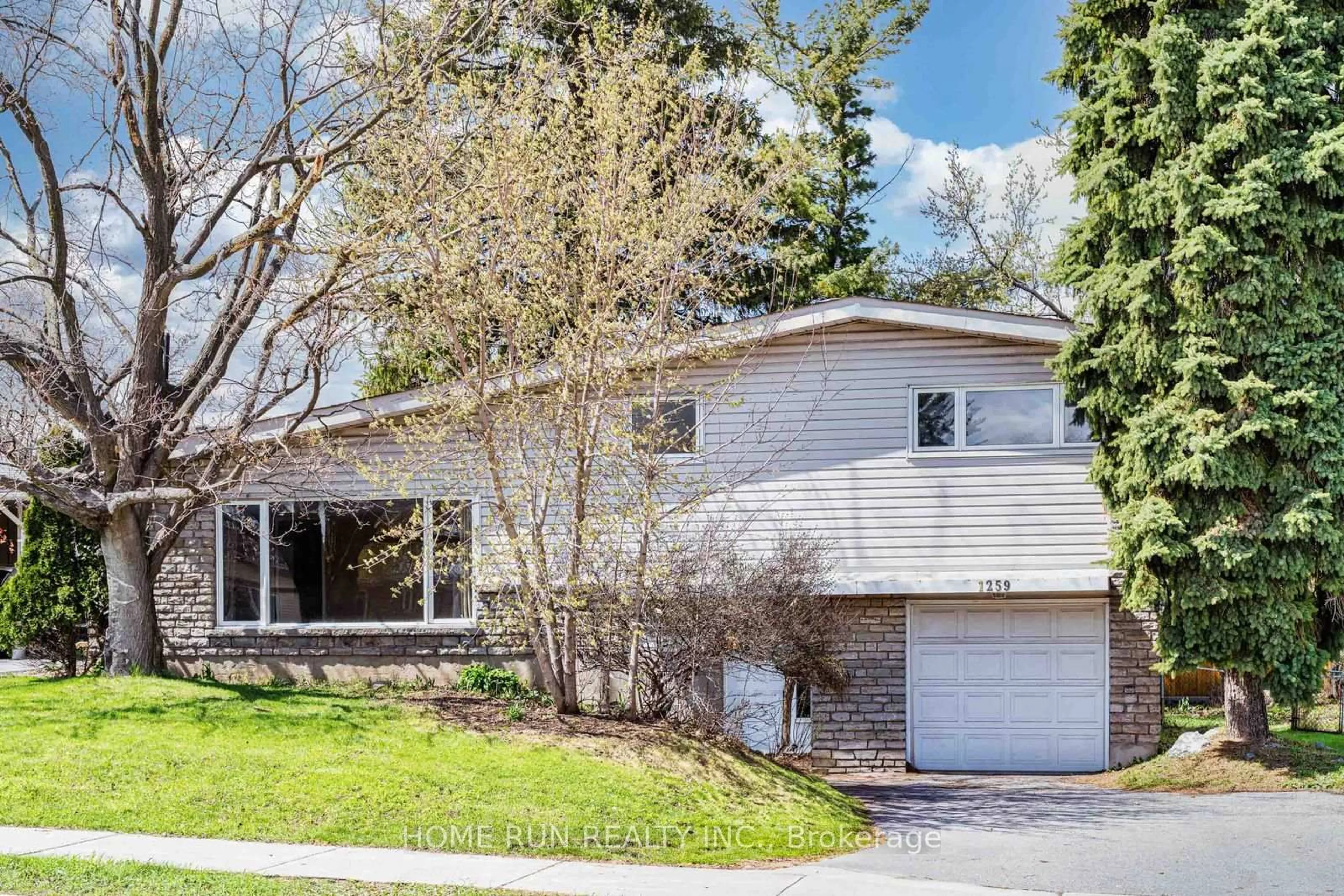 Home with vinyl exterior material, street for 1259 Meadowlands Dr, Ottawa Ontario K2E 6K4