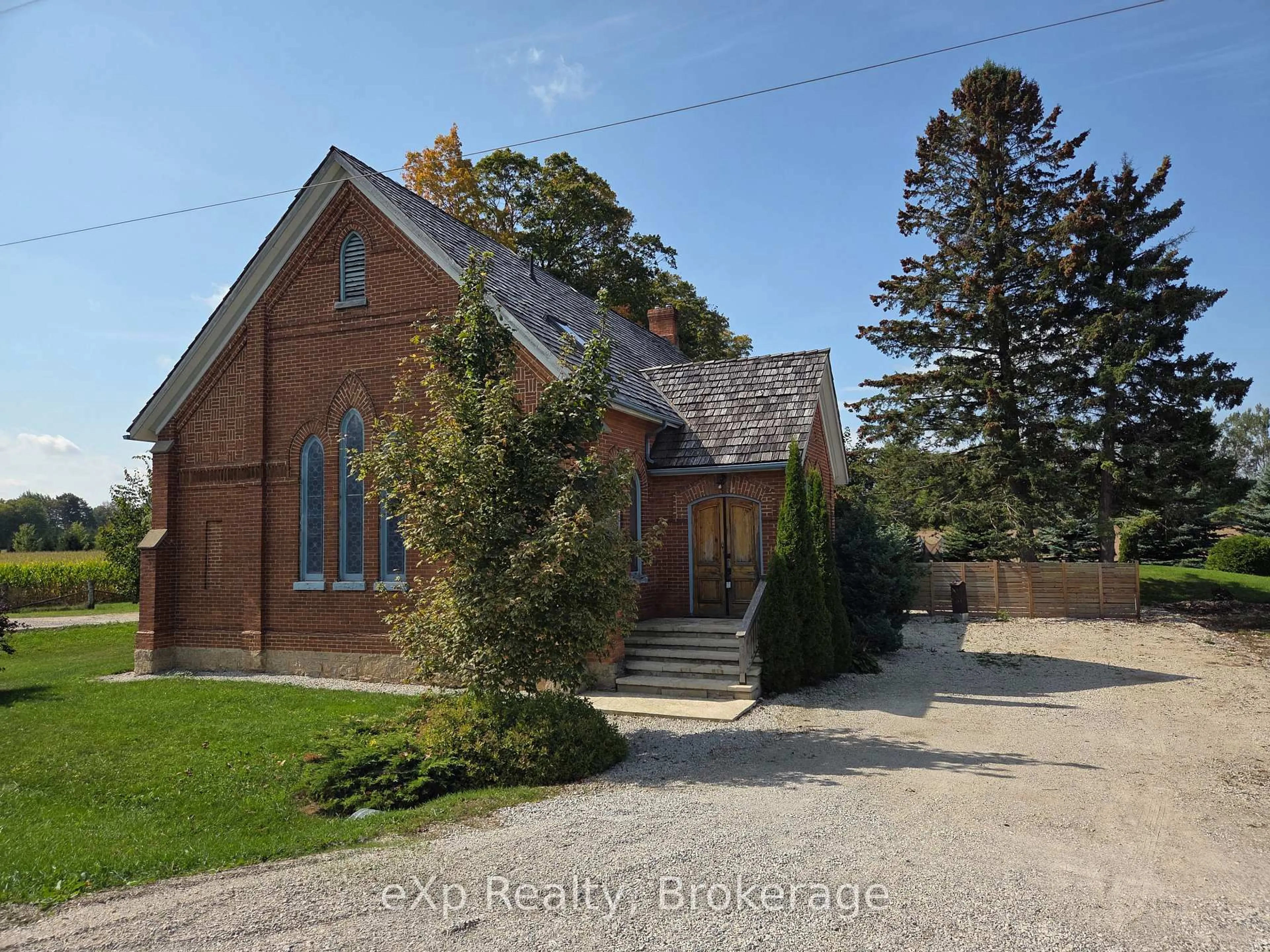 A pic from outside/outdoor area/front of a property/back of a property/a pic from drone, street for 137190 Grey Road 12, Meaford Ontario N4L 1W6