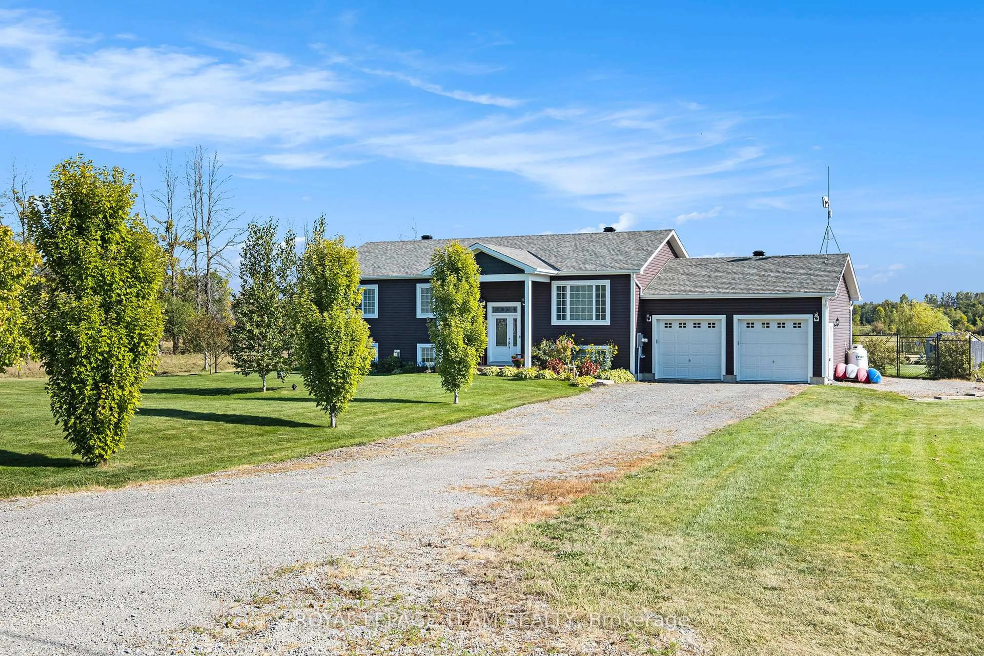 Home with vinyl exterior material, street for 1503 Hyndman Rd, Edwardsburgh/Cardinal Ontario K0E 1X0