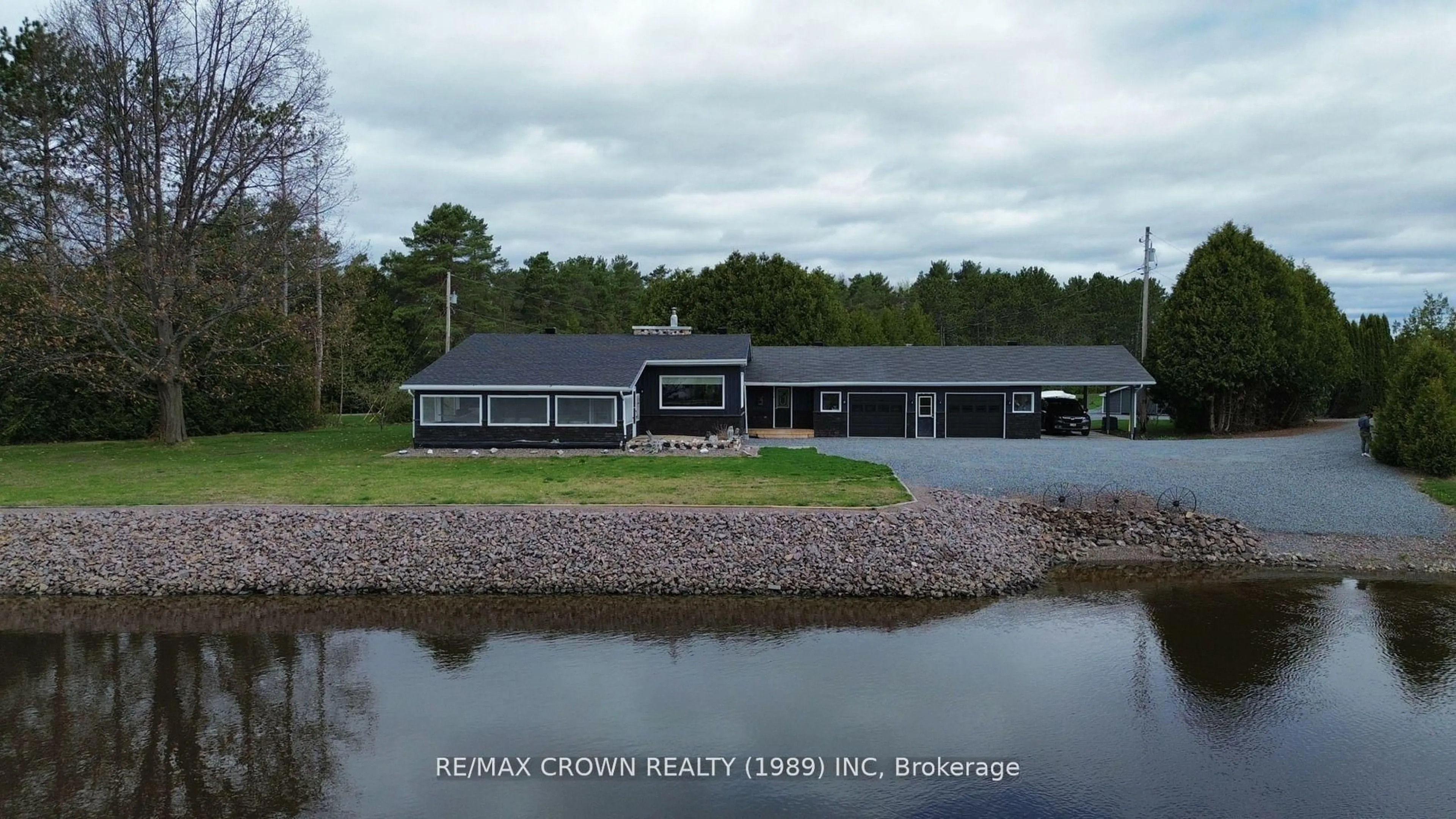 A pic from outside/outdoor area/front of a property/back of a property/a pic from drone, water/lake/river/ocean view for 790 Lalande Rd, West Nipissing Ontario P2B 2V4