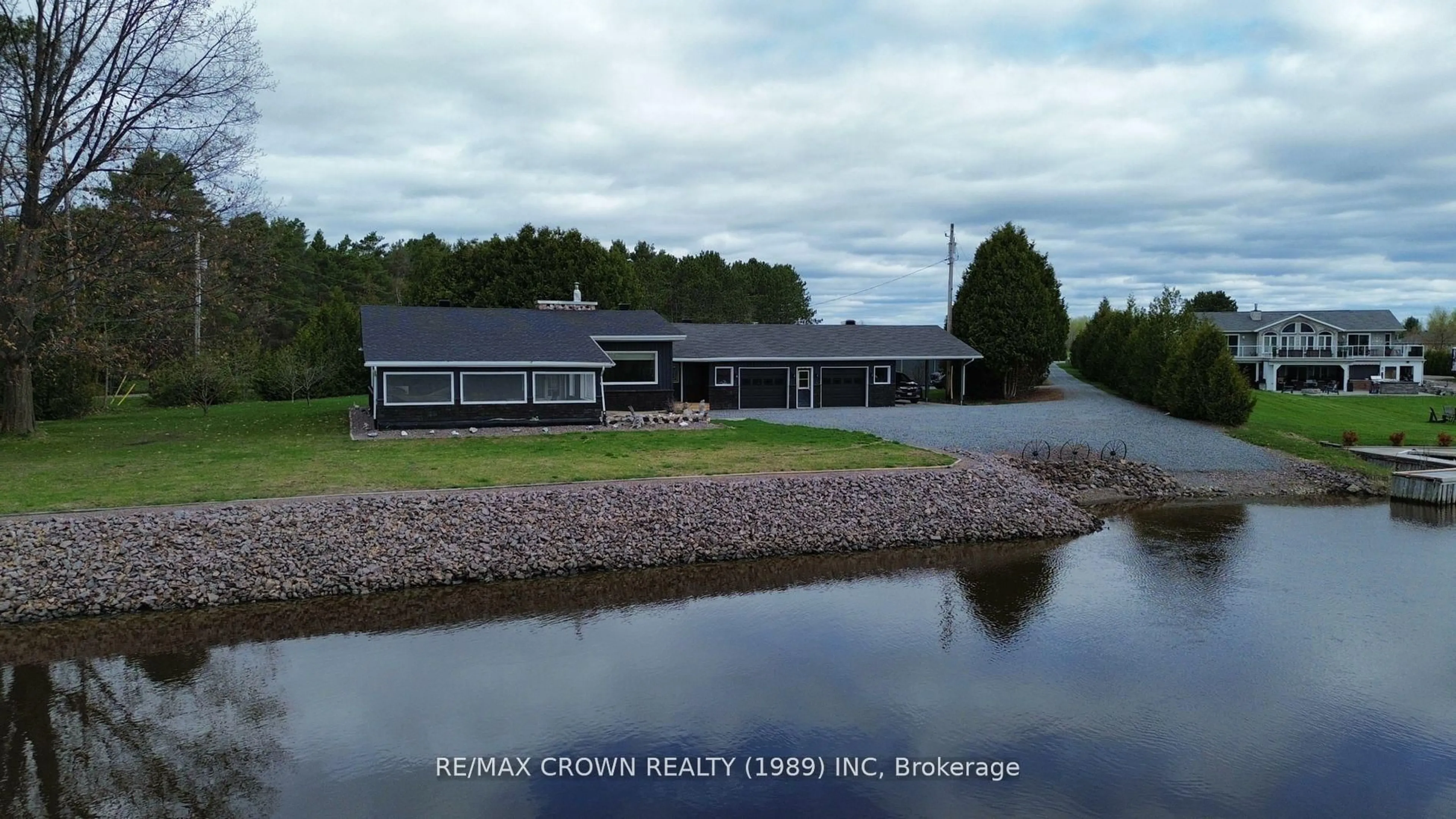 A pic from outside/outdoor area/front of a property/back of a property/a pic from drone, water/lake/river/ocean view for 790 Lalande Rd, West Nipissing Ontario P2B 2V4