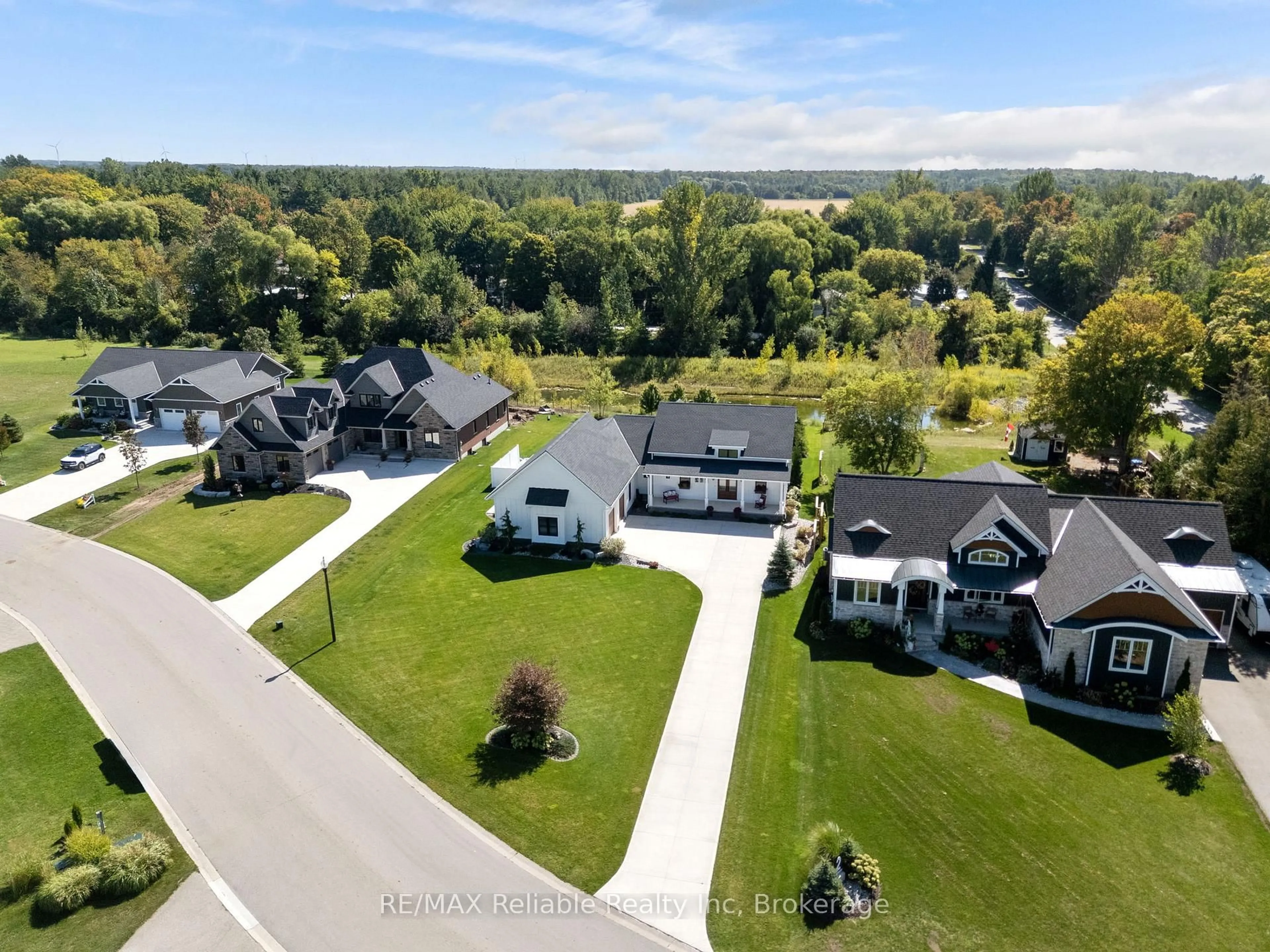 A pic from outside/outdoor area/front of a property/back of a property/a pic from drone, water/lake/river/ocean view for 4 Fawn Creek Lane, Bluewater Ontario N0M 1G0