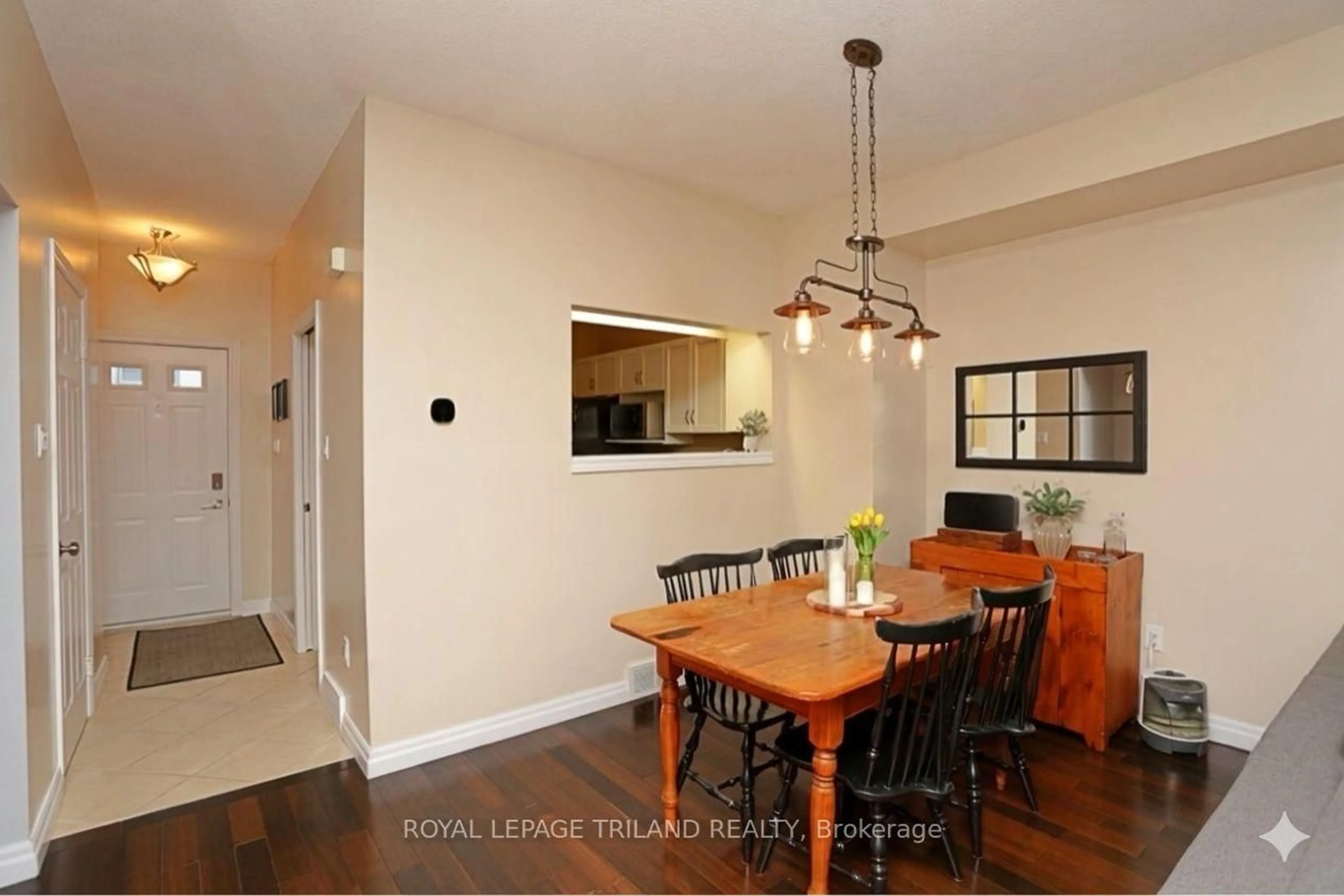 Dining room, wood/laminate floor for 1415 Commissioners Rd #16, London South Ontario N6K 1E2