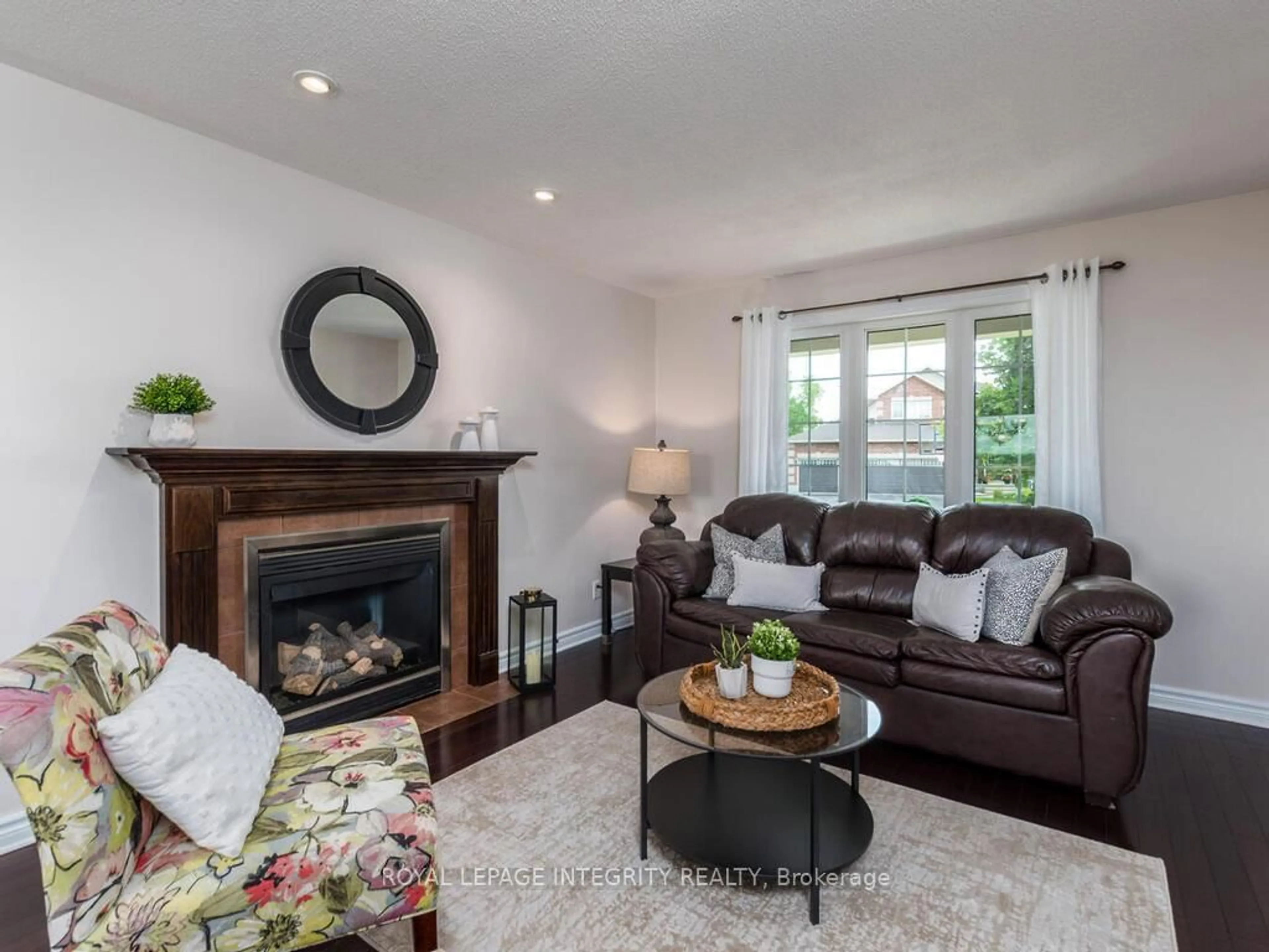 Living room with furniture, wood/laminate floor for 111 Comba Dr, Carleton Place Ontario K7C 4V2