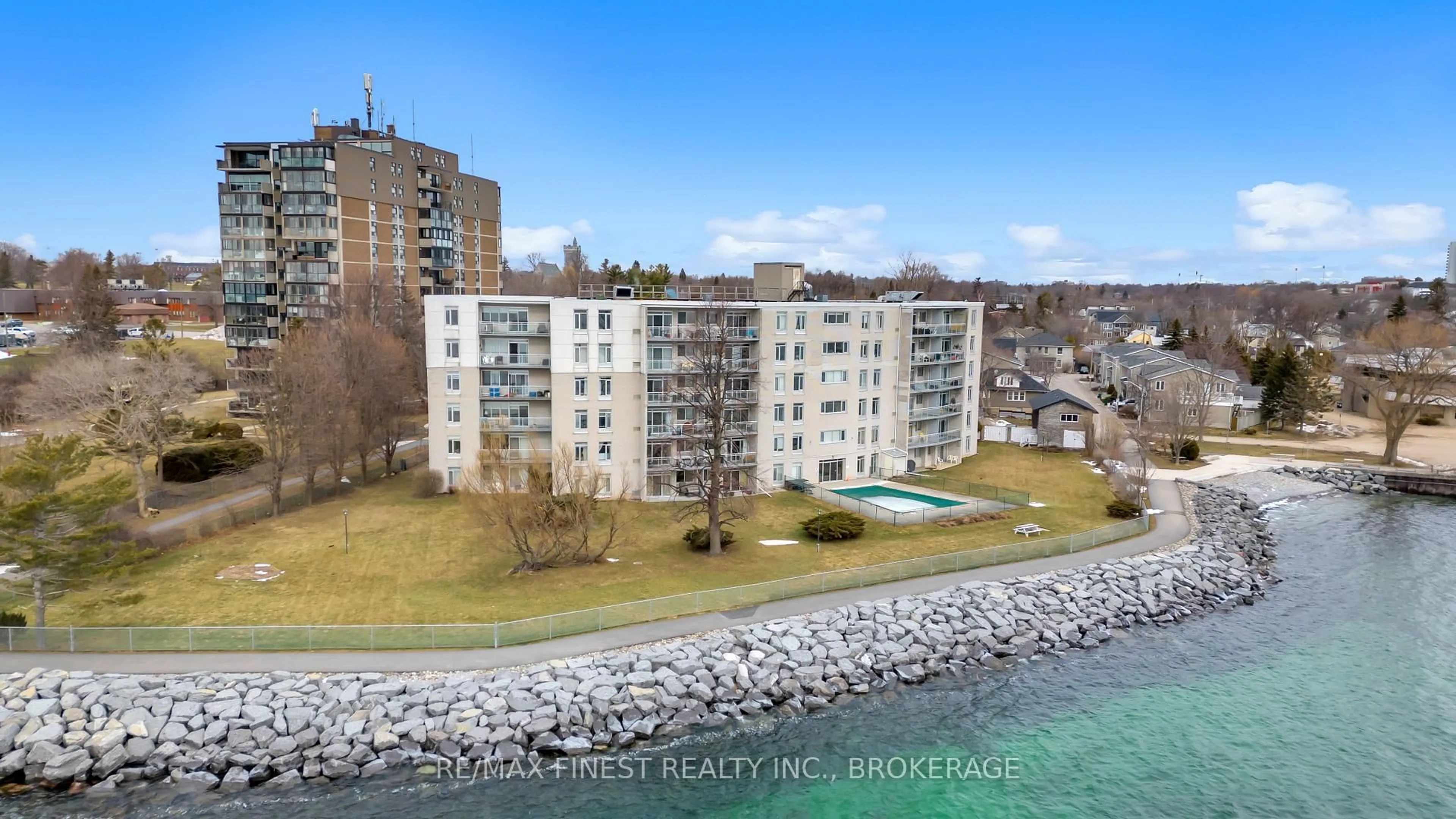 A pic from outside/outdoor area/front of a property/back of a property/a pic from drone, water/lake/river/ocean view for 1 Mowat Ave #106, Kingston Ontario K7M 1J8