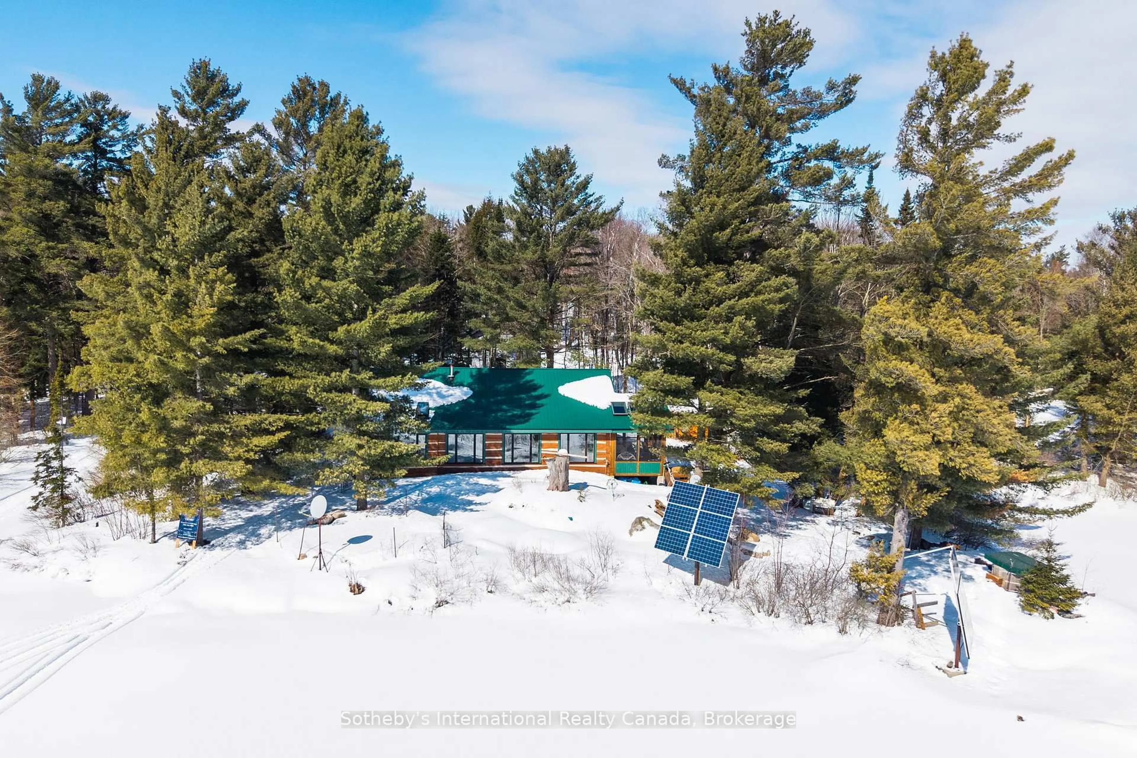 A pic from outside/outdoor area/front of a property/back of a property/a pic from drone, forest/trees view for 3491A Axe Lake Rd, McMurrich/Monteith Ontario P0A 1Y0