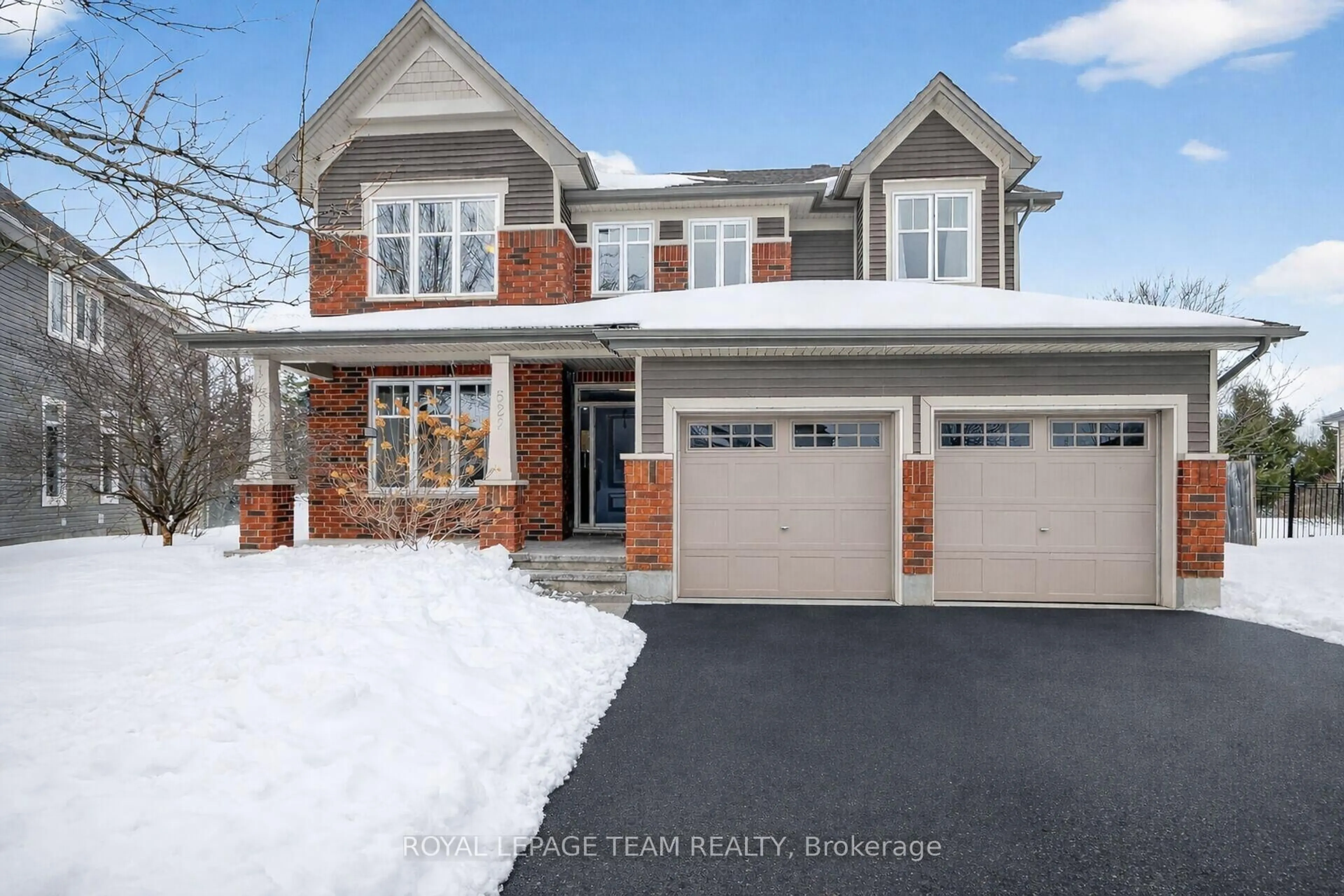 Home with brick exterior material, street for 528 Bryce Pl, Stittsville Ontario K2S 0N2
