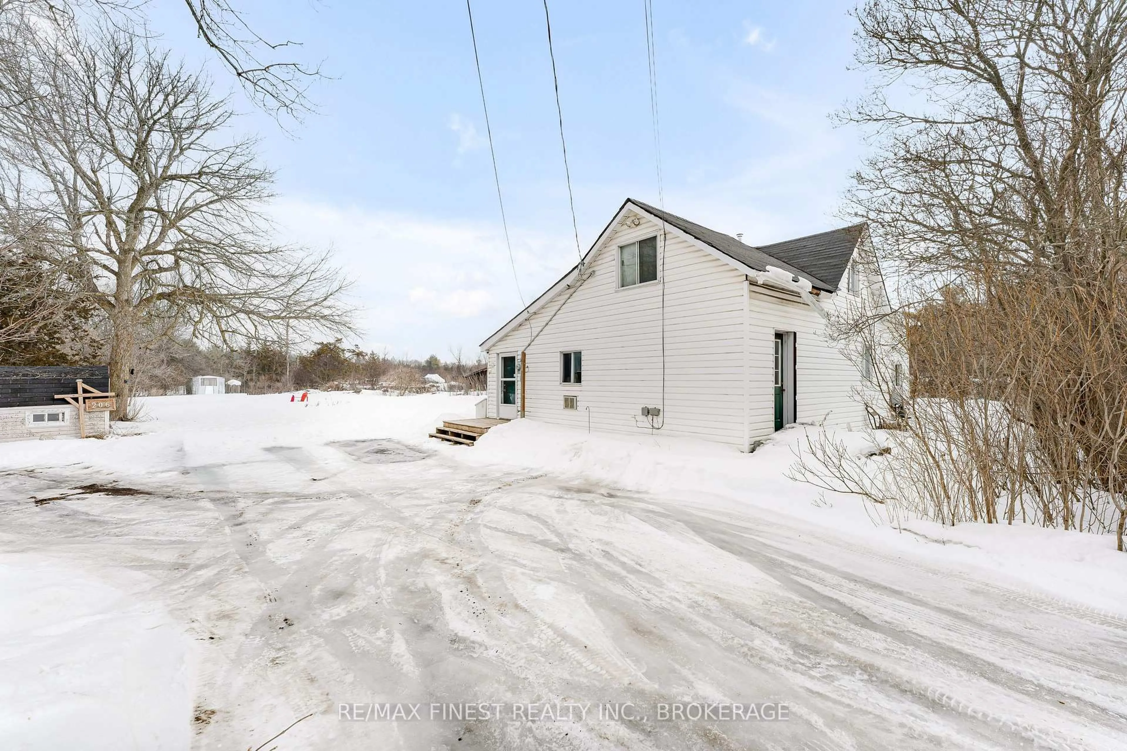 A pic from outside/outdoor area/front of a property/back of a property/a pic from drone, street for 206 Main St, Bissett Creek Ontario K0H 2H0