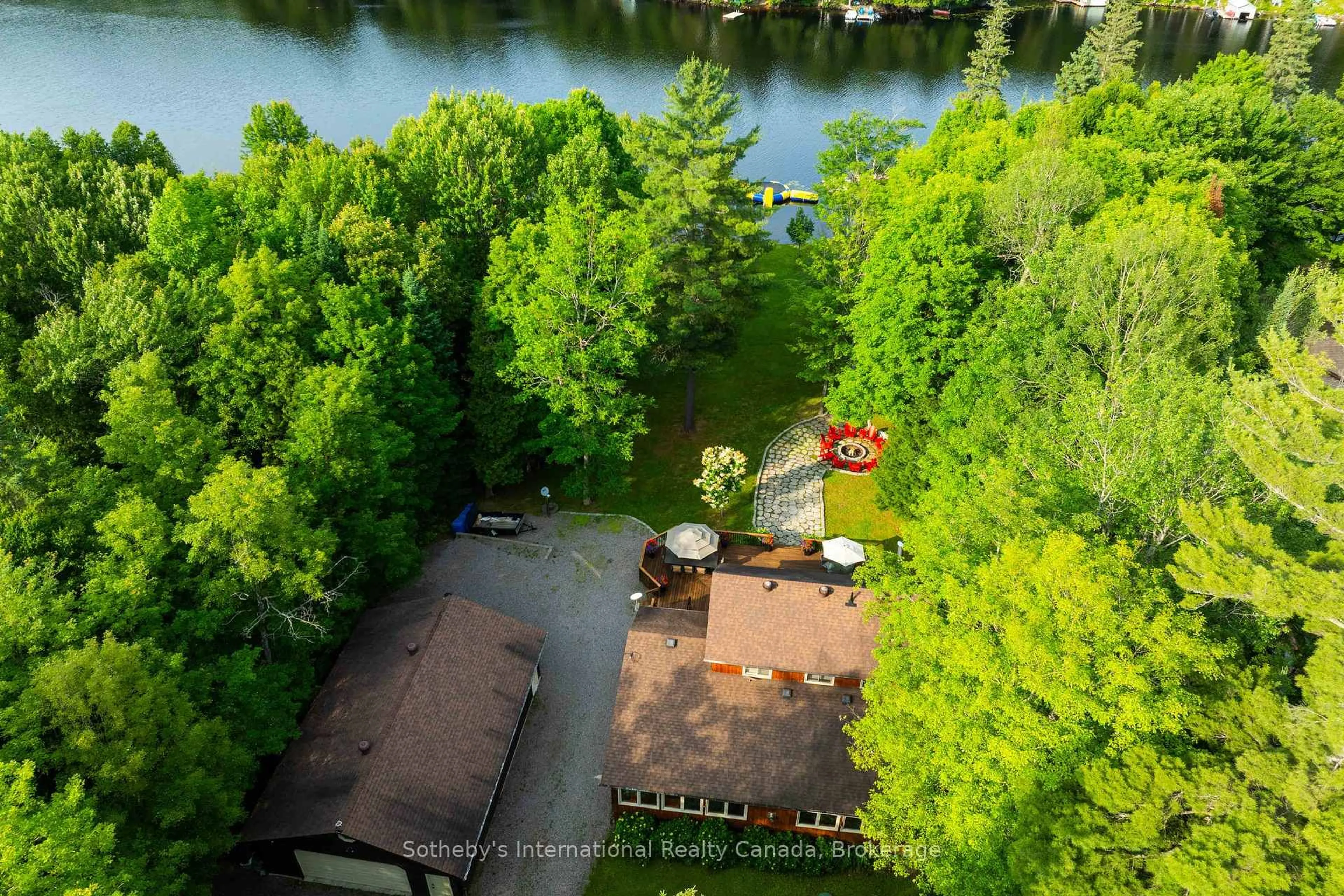 A pic from outside/outdoor area/front of a property/back of a property/a pic from drone, water/lake/river/ocean view for 775 Rosskopf Rd, Magnetawan Ontario P0A 1C0