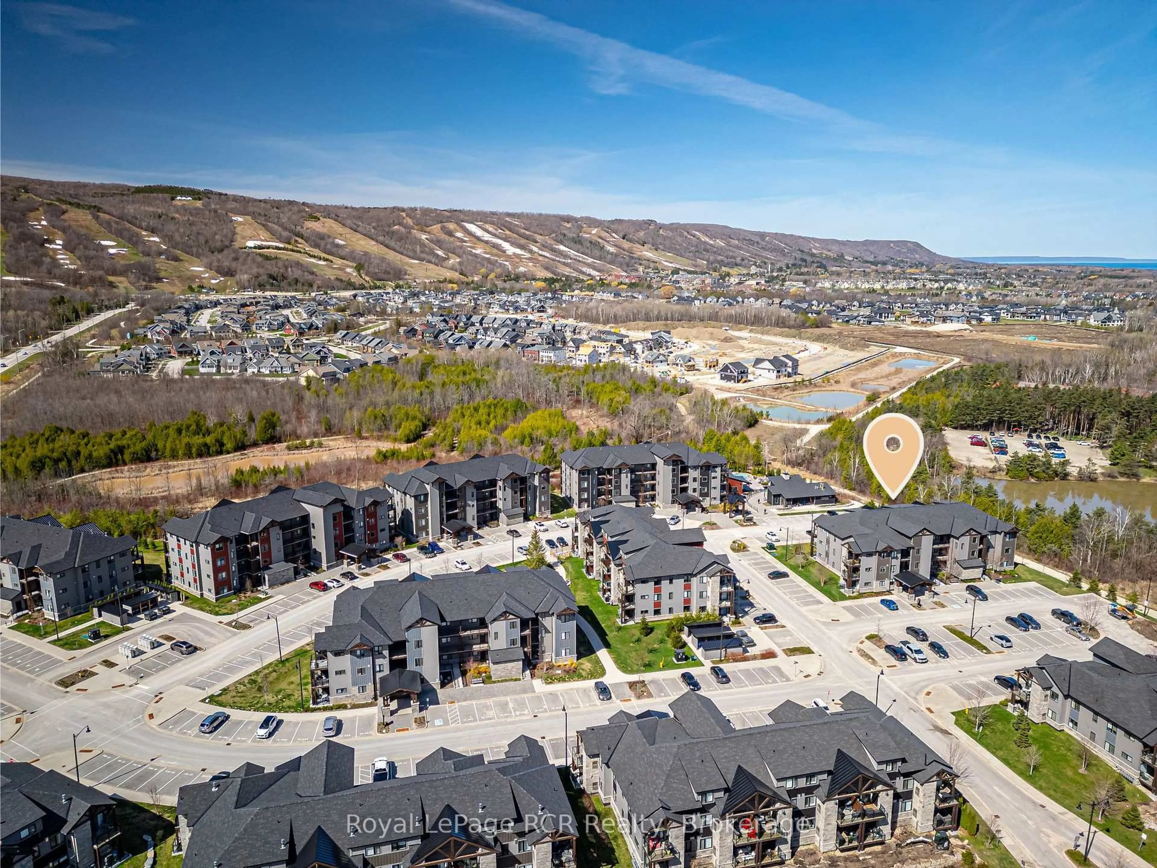 A pic from outside/outdoor area/front of a property/back of a property/a pic from drone, mountain view for 12 Beckwith Lane #305, Blue Mountains Ontario L9Y 0A4