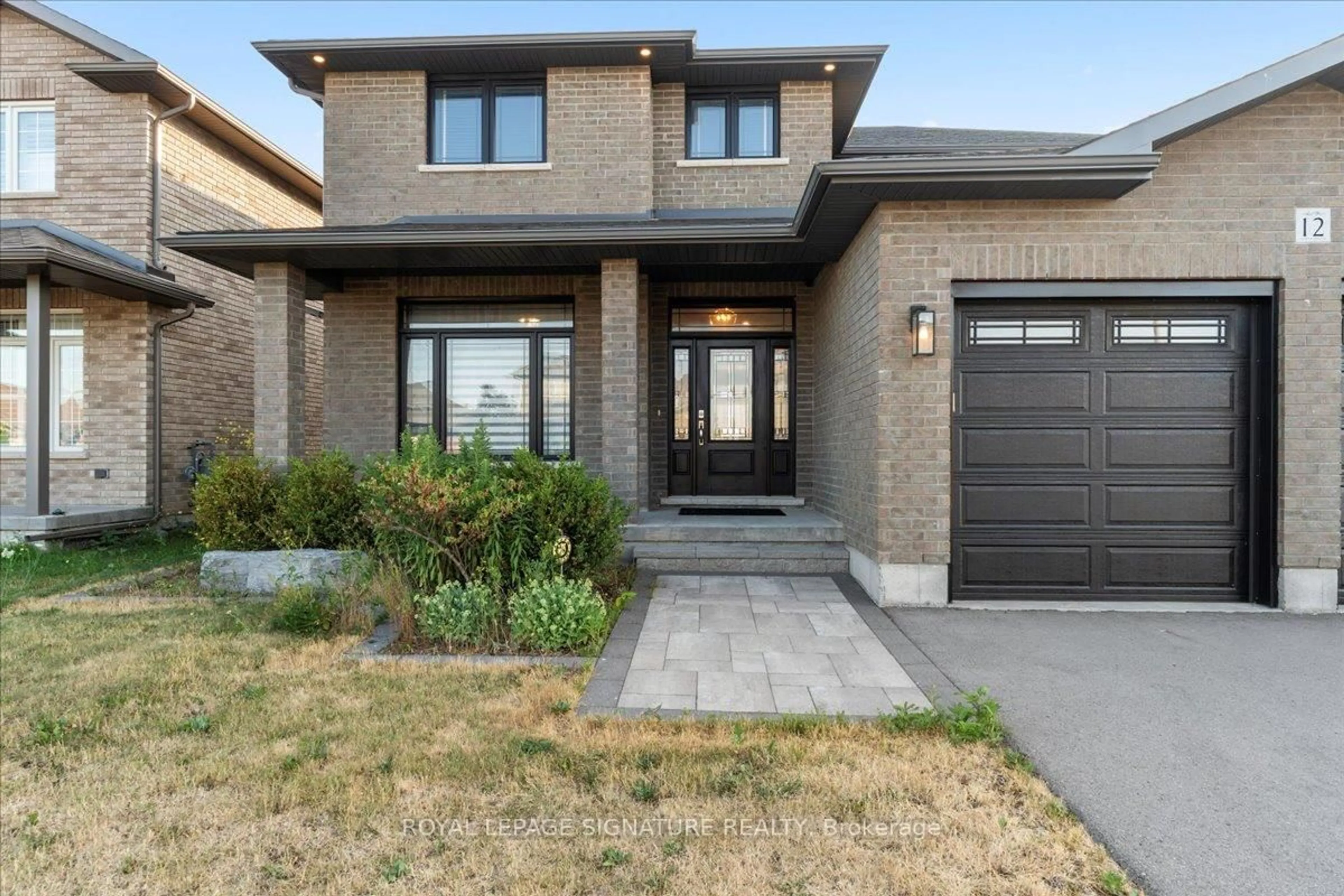 Home with brick exterior material, street for 12 Hummingbird Dr, Belleville Ontario K8N 0H7