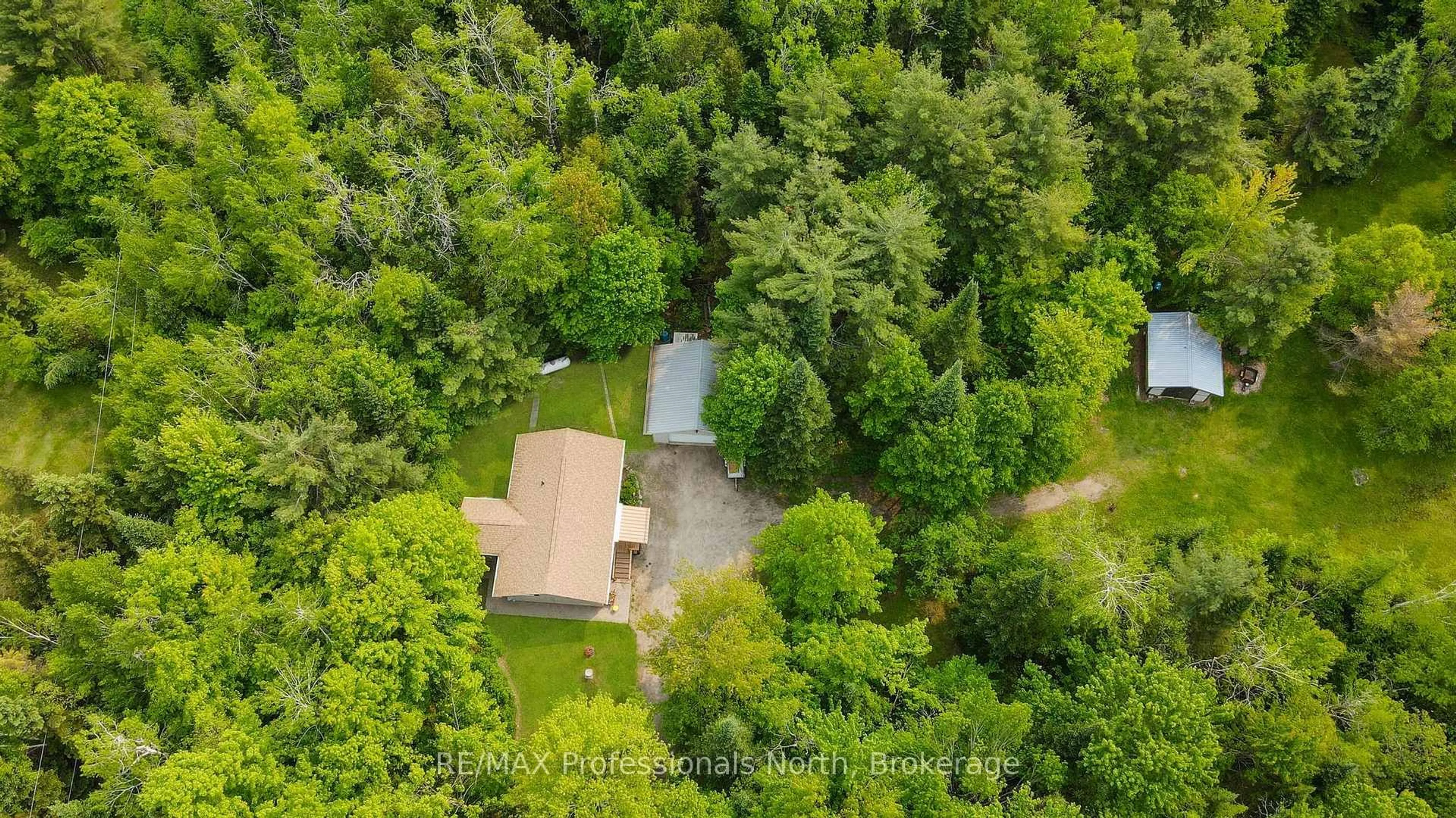A pic from outside/outdoor area/front of a property/back of a property/a pic from drone, forest/trees view for 3072 Gelert Rd, Minden Hills Ontario K0M 2K0