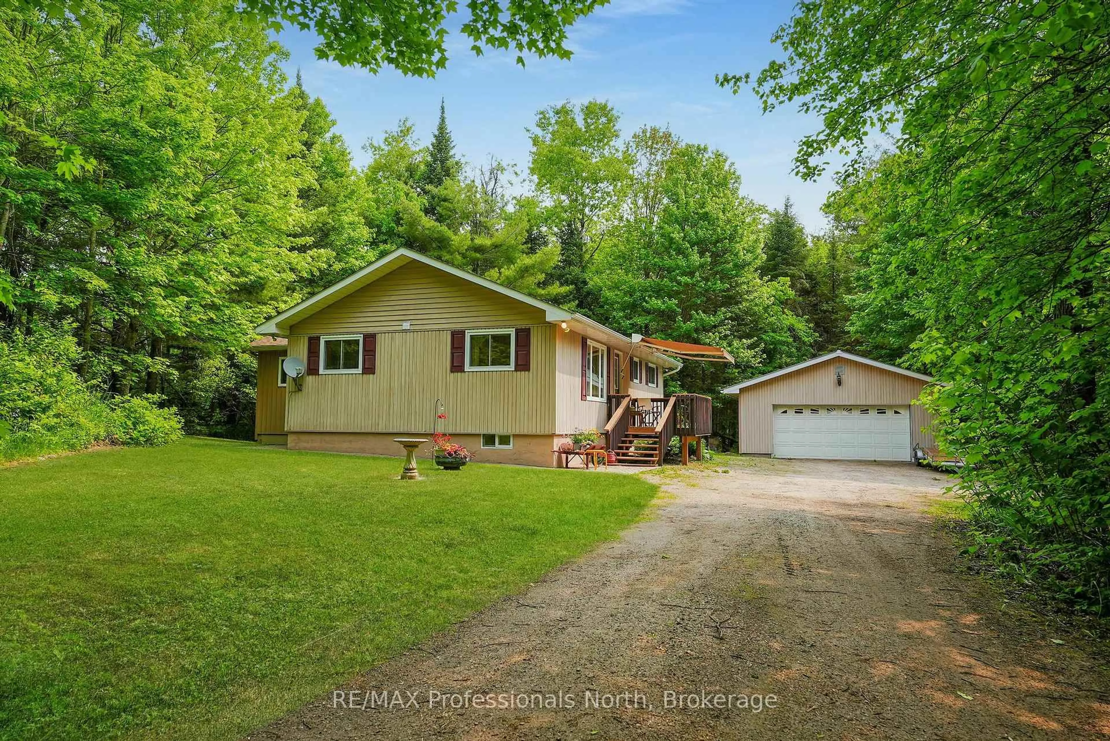 A pic from outside/outdoor area/front of a property/back of a property/a pic from drone, street for 3072 Gelert Rd, Minden Hills Ontario K0M 2K0