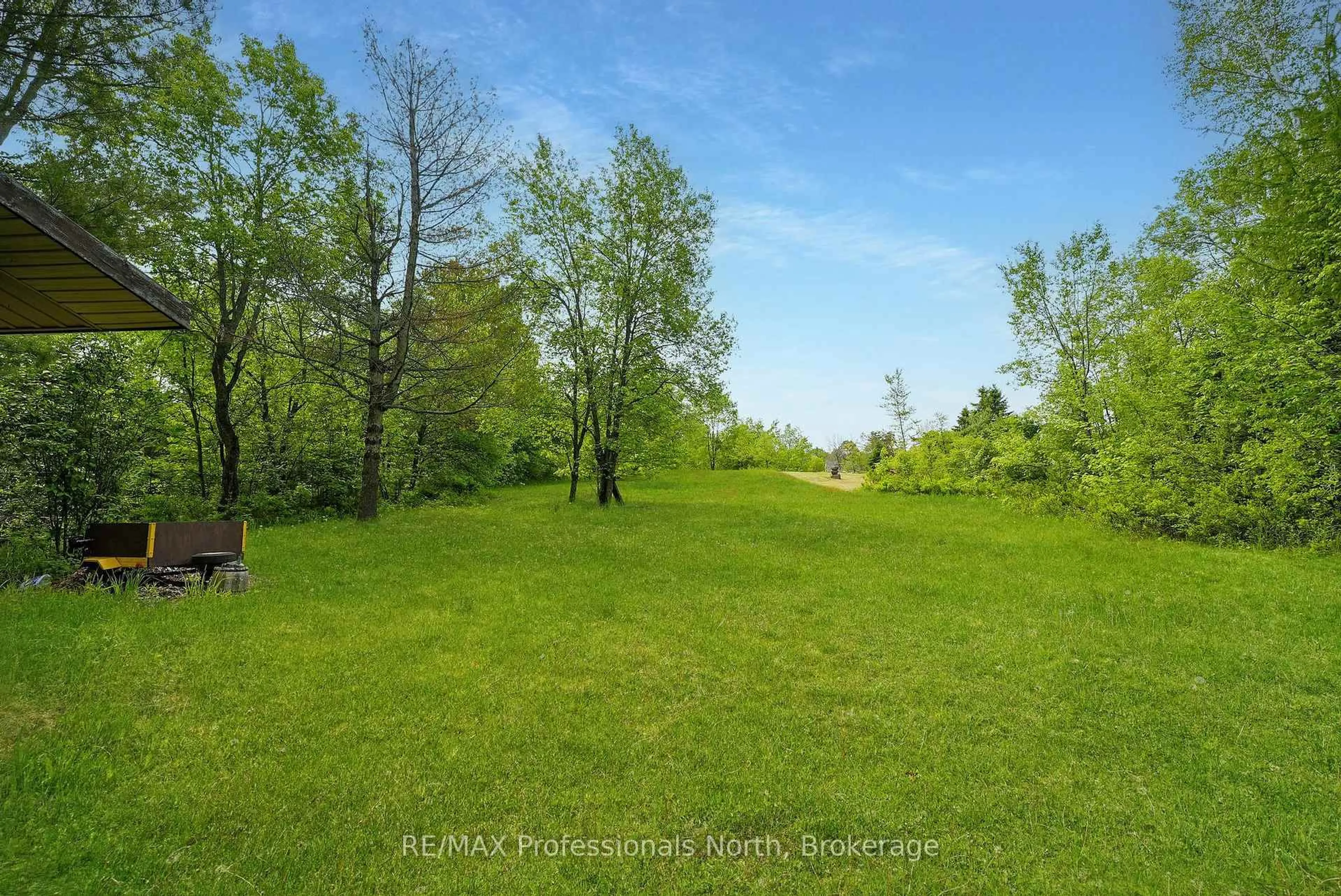 A pic from outside/outdoor area/front of a property/back of a property/a pic from drone, forest/trees view for 3072 Gelert Rd, Minden Hills Ontario K0M 2K0