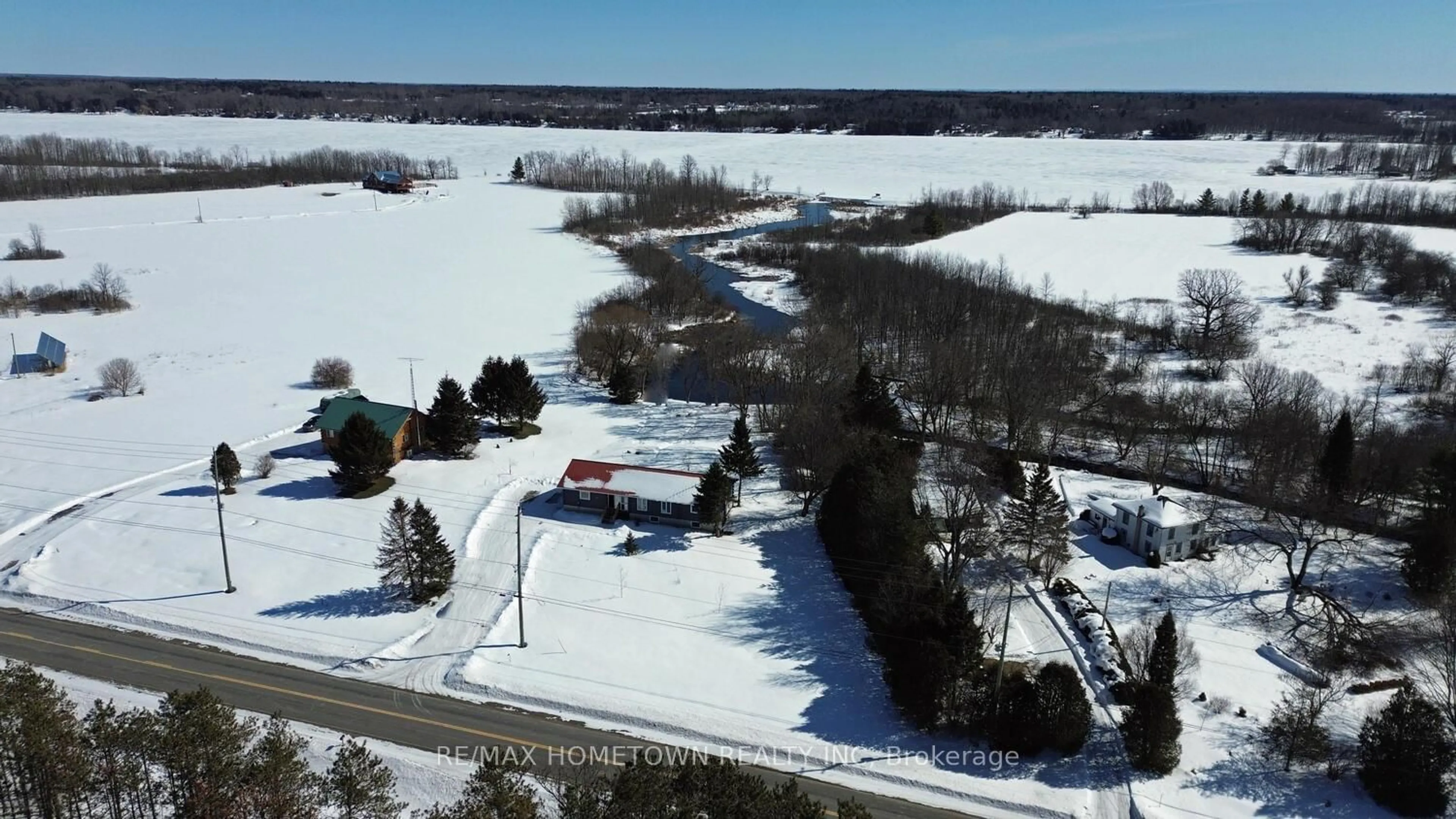 A pic from outside/outdoor area/front of a property/back of a property/a pic from drone, water/lake/river/ocean view for 323 County Rd 5 Rd, Front of Yonge Ontario K0E 1R0