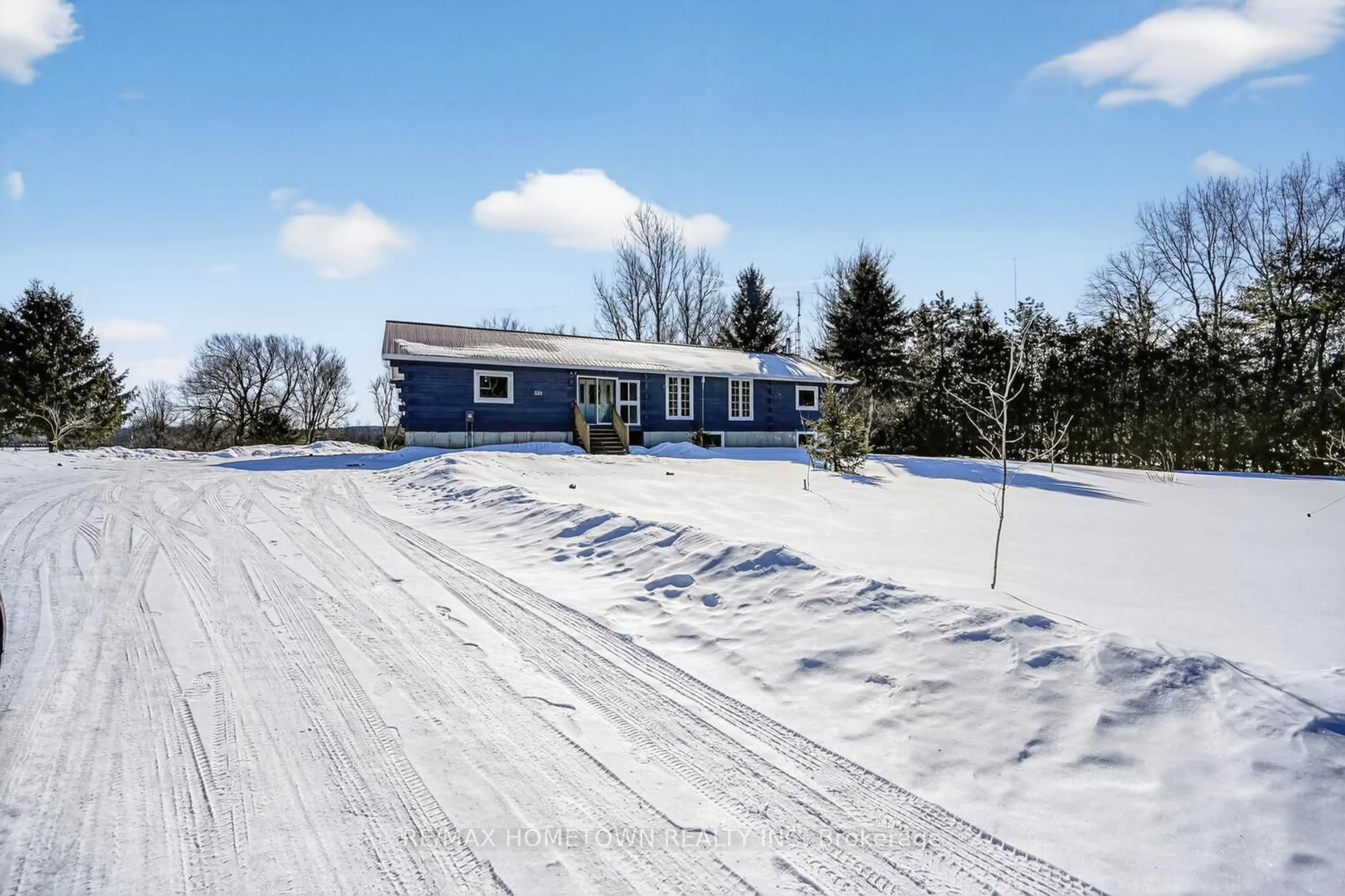 A pic from outside/outdoor area/front of a property/back of a property/a pic from drone, unknown for 323 County Rd 5 Rd, Front of Yonge Ontario K0E 1R0