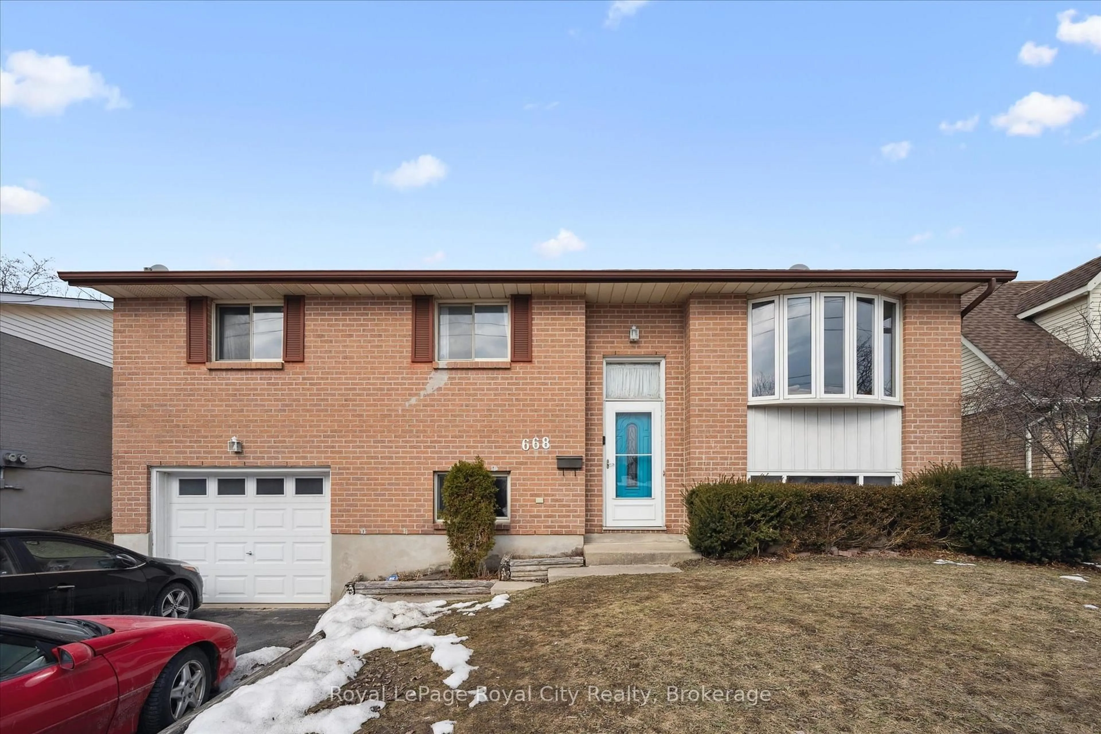 Home with brick exterior material, street for 668 Edinburgh Rd, Guelph Ontario N1G 4H8
