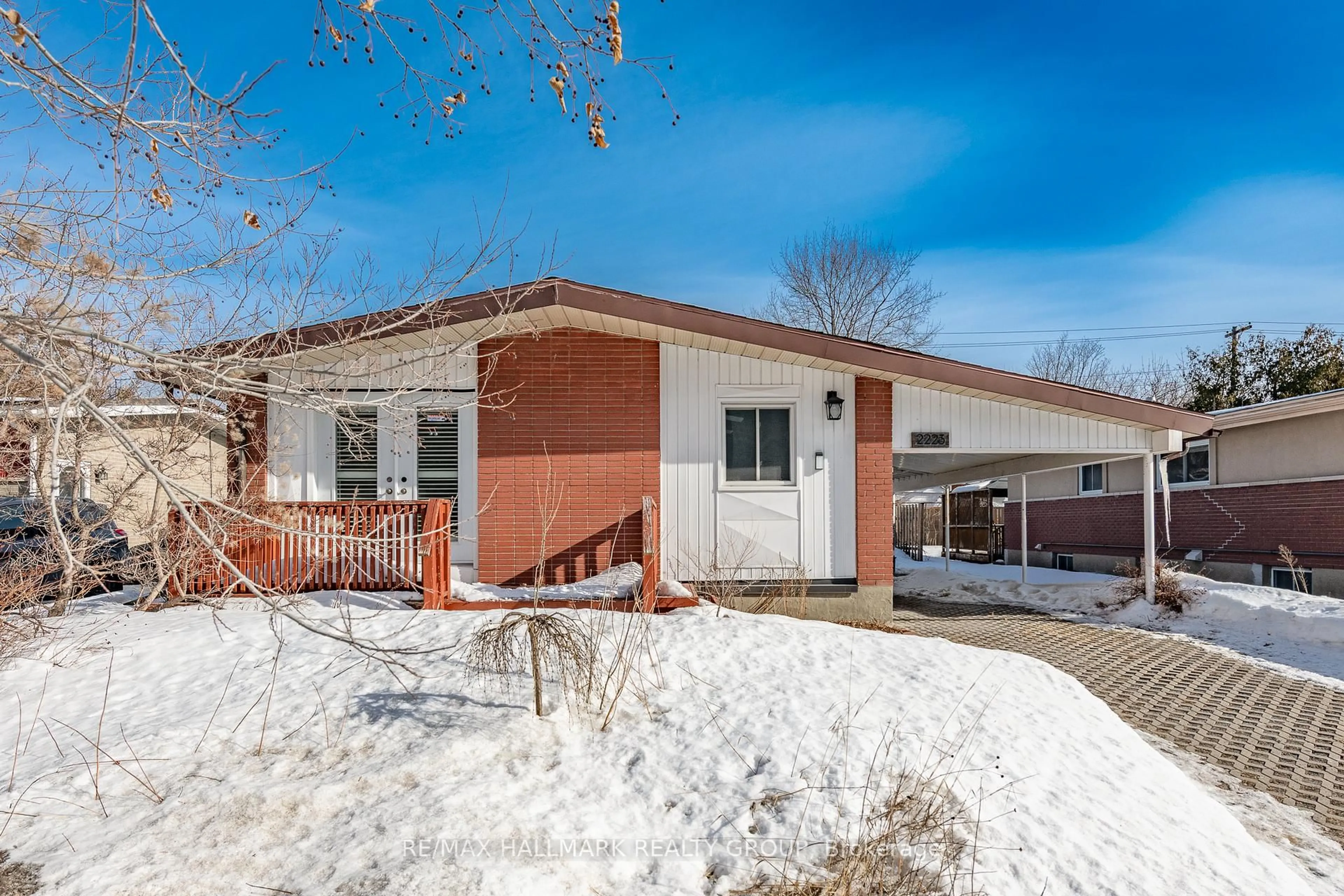 Home with brick exterior material, street for 2223 Halifax Dr, Ottawa Ontario K1G 2W4