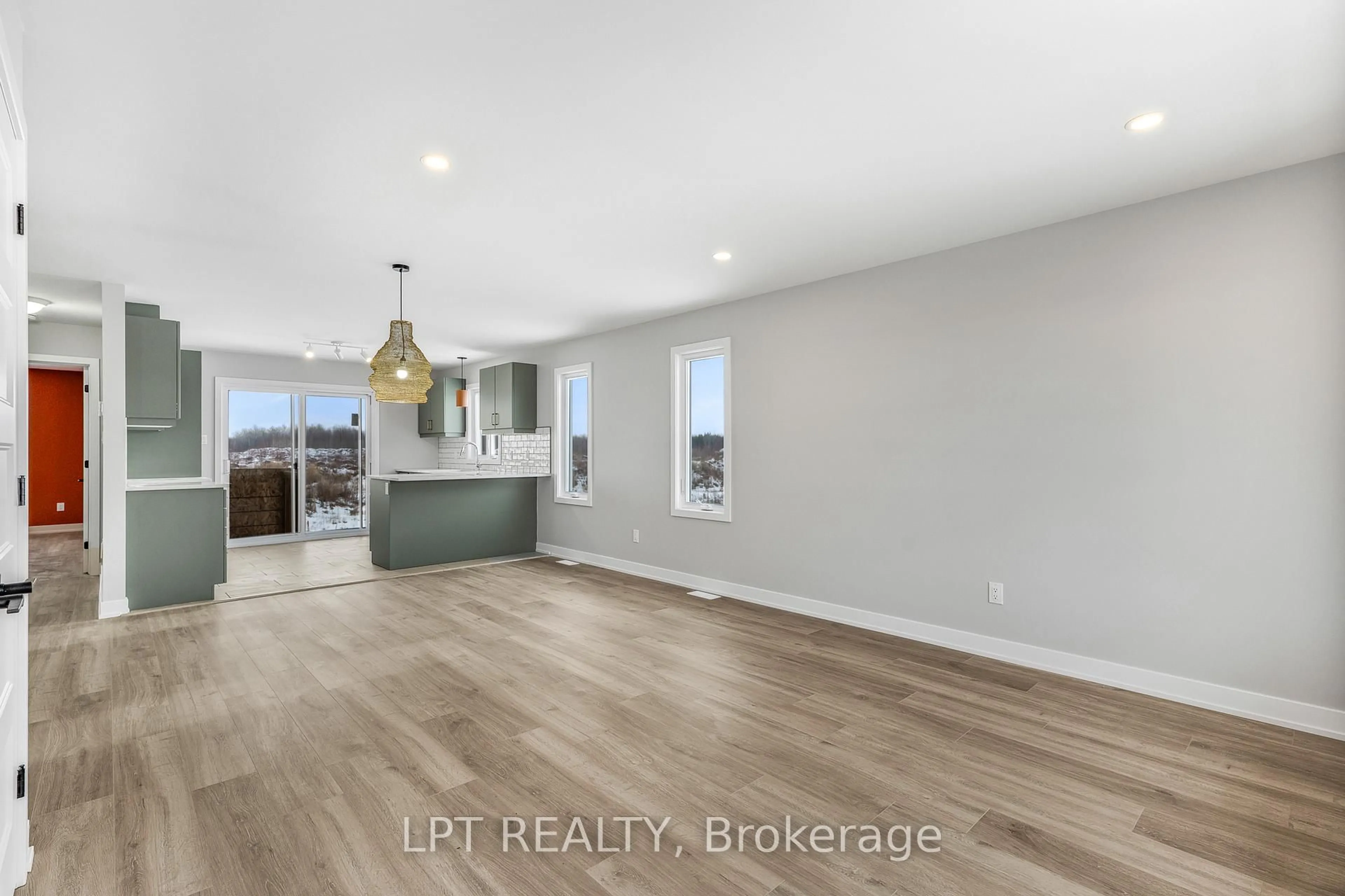 Open concept kitchen, wood/laminate floor for 965 Katia St, The Nation Ontario K0A 2M0