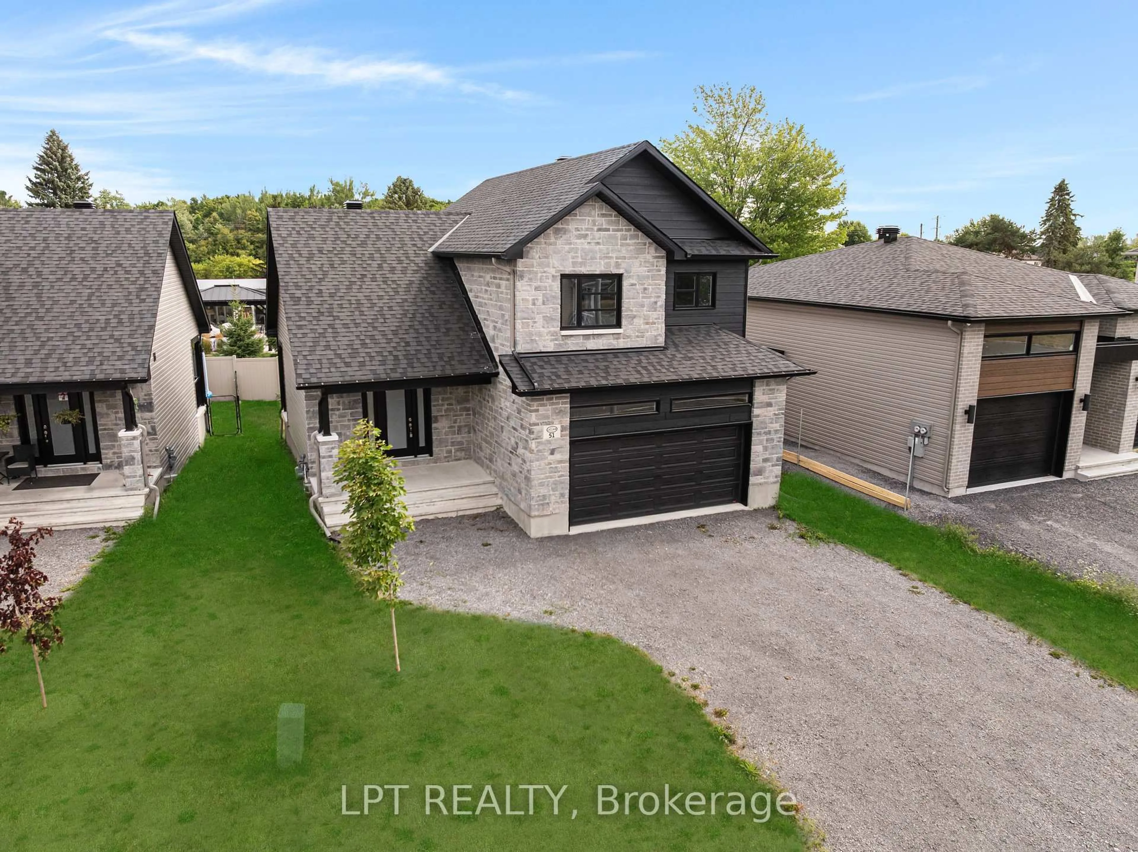 A pic from outside/outdoor area/front of a property/back of a property/a pic from drone, street for 932 Katia St, The Nation Ontario K0A 2M0